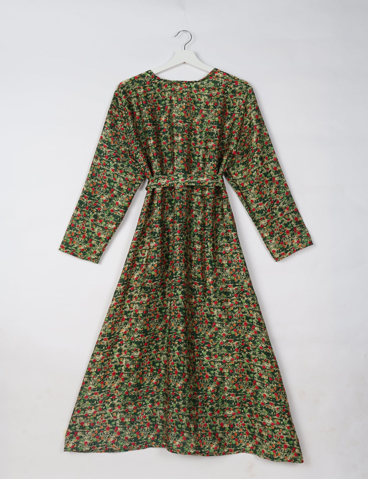 Green beach robe with red and beige abstract floral print, long sleeves, belt, and round neckline, shown hanging flat back view