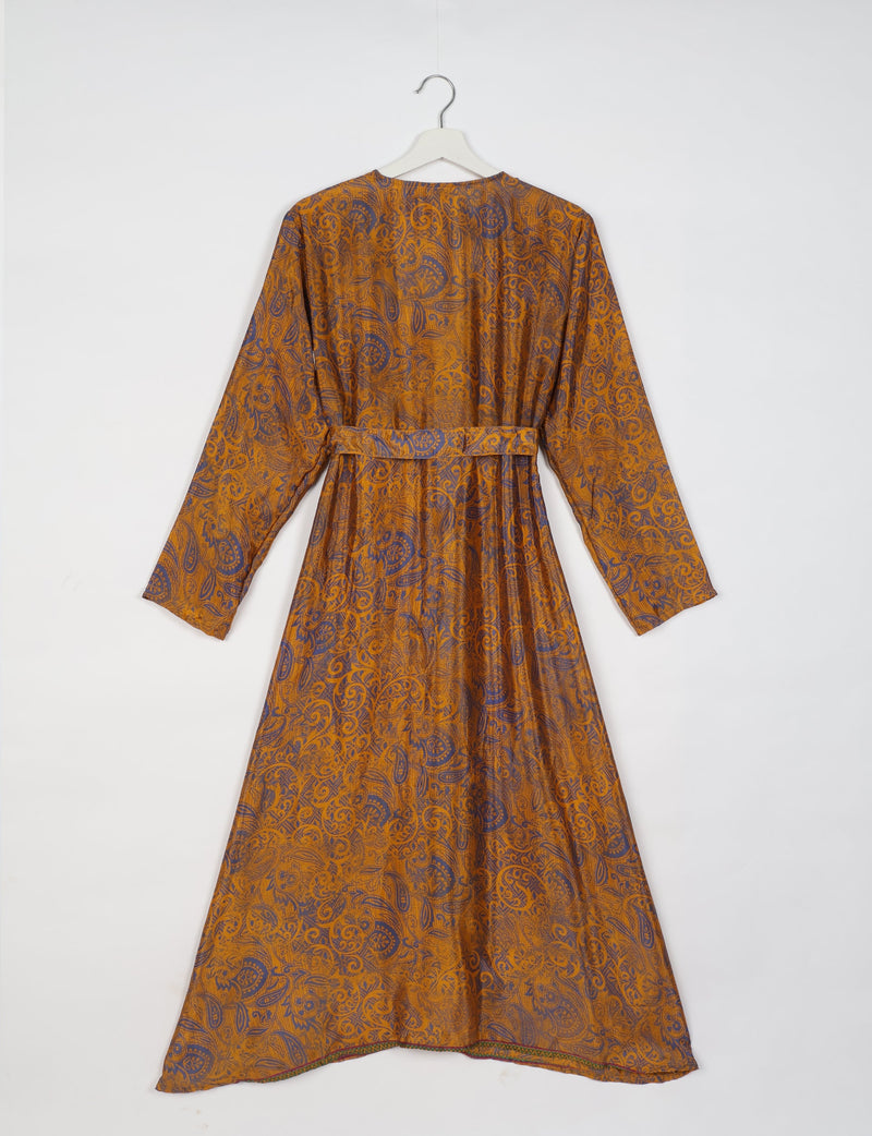 Yellow and purple paisley patterned long-sleeve beach robe with belt, shown from back on white hanger against white