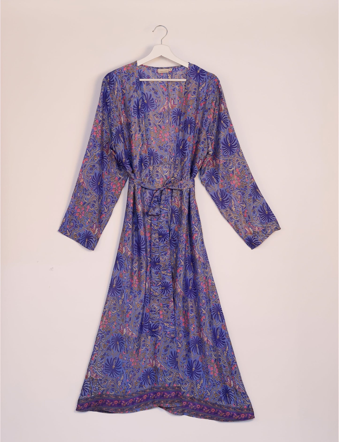 Beach robe made from upcycled saris, embodying ethical and sustainable fashion principles. Perfect for eco-conscious beachgoers and mindful living enthusiasts.