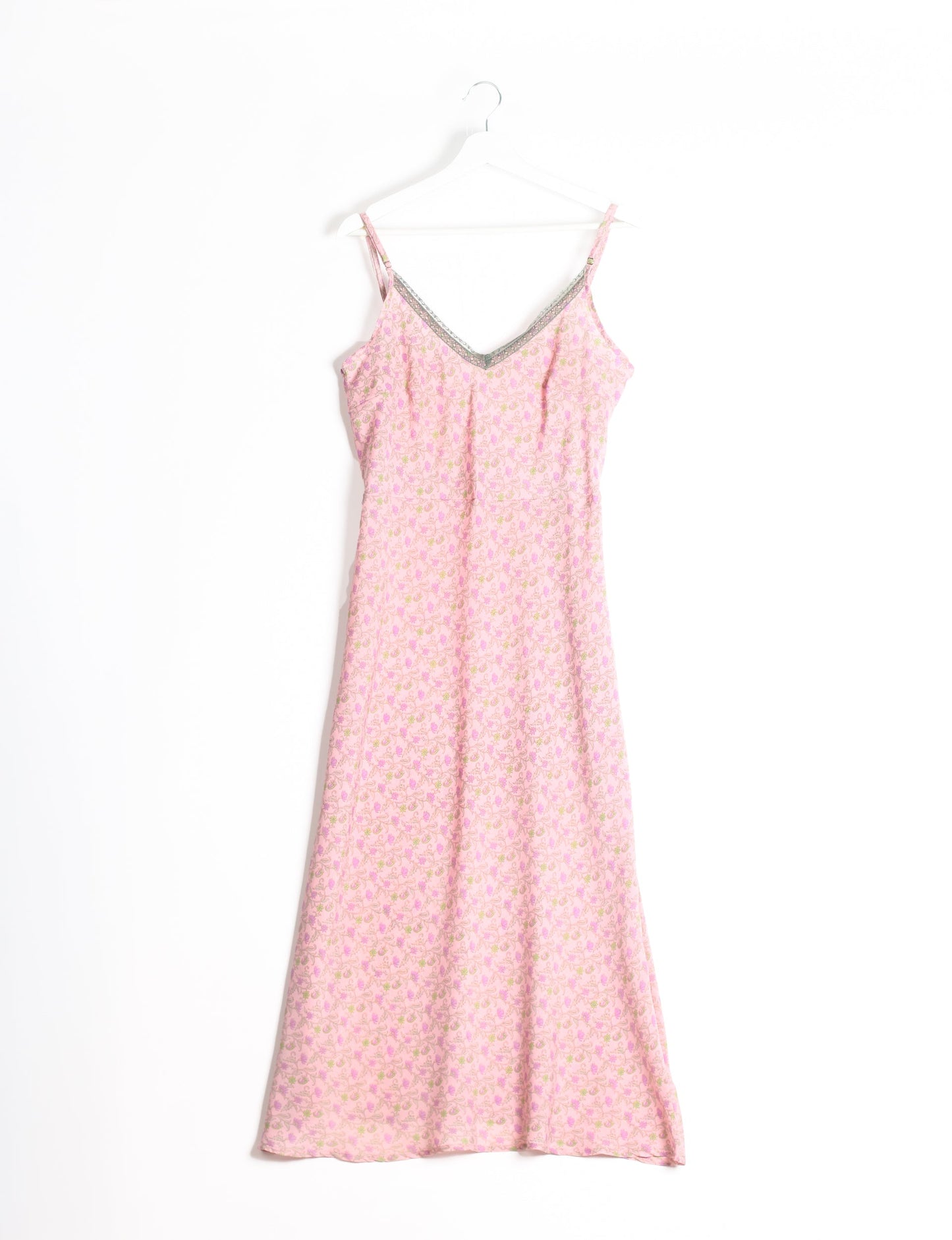 Spaghetti strap dress made from sustainable materials, embodying ethical fashion principles. Ideal for eco-friendly travelers seeking laid-back style.