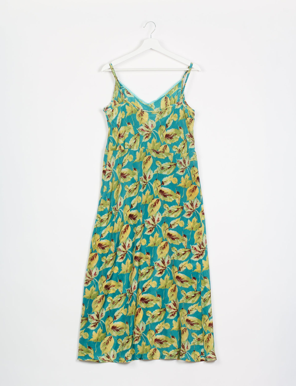 Spaghetti strap dress made from sustainable materials, embodying ethical fashion principles. Ideal for eco-friendly travelers seeking laid-back style.