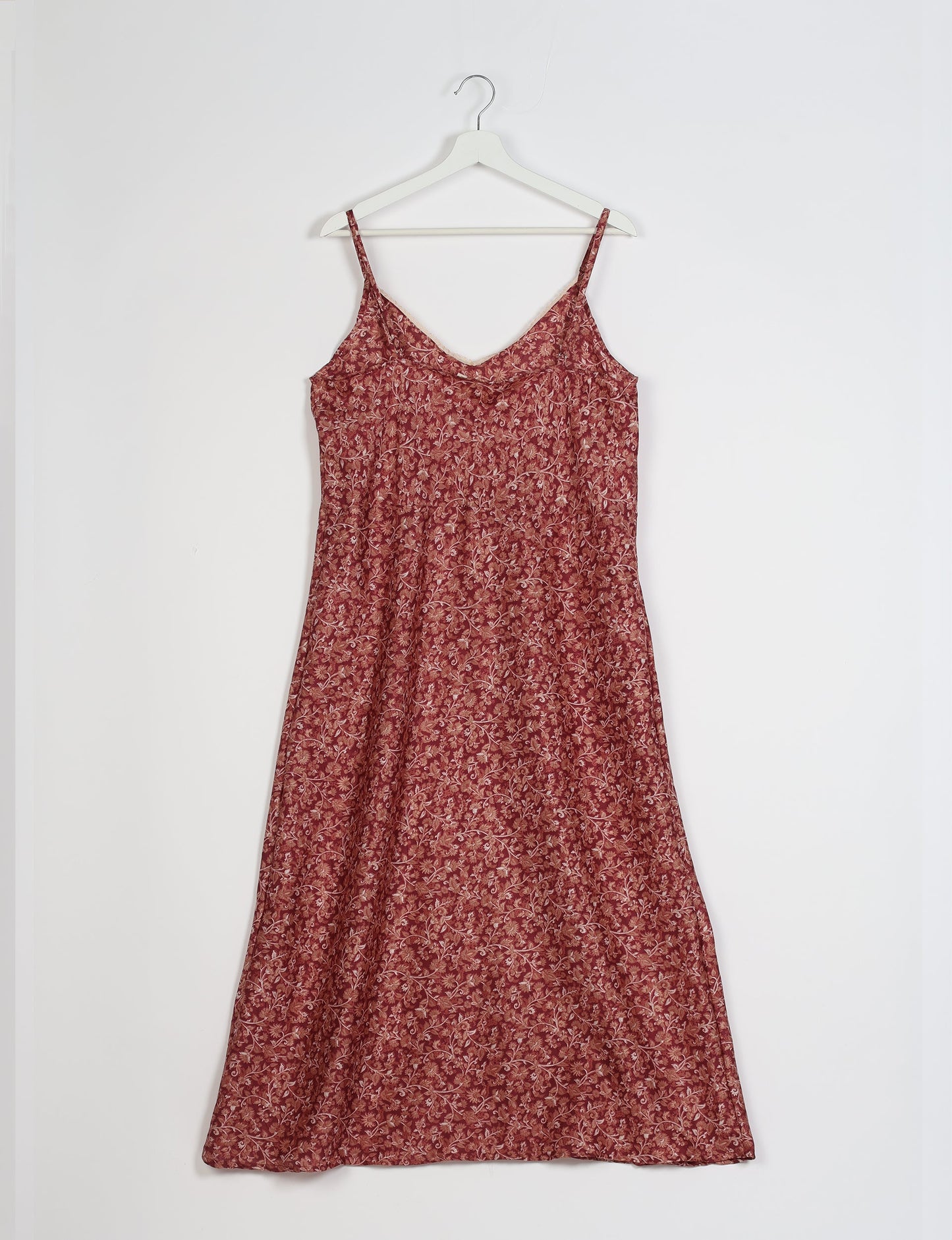 Spaghetti strap dress made from sustainable materials, embodying ethical fashion principles. Ideal for eco-friendly travelers seeking laid-back style.