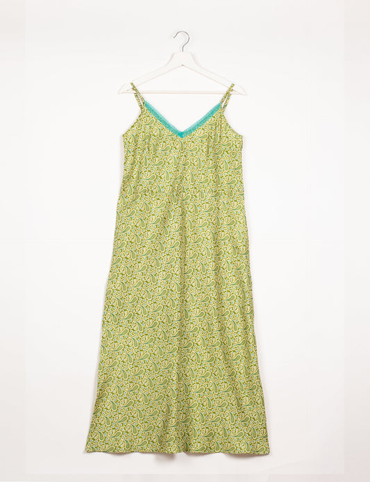 Spaghetti strap dress made from sustainable materials, embodying ethical fashion principles. Ideal for eco-friendly travelers seeking laid-back style.