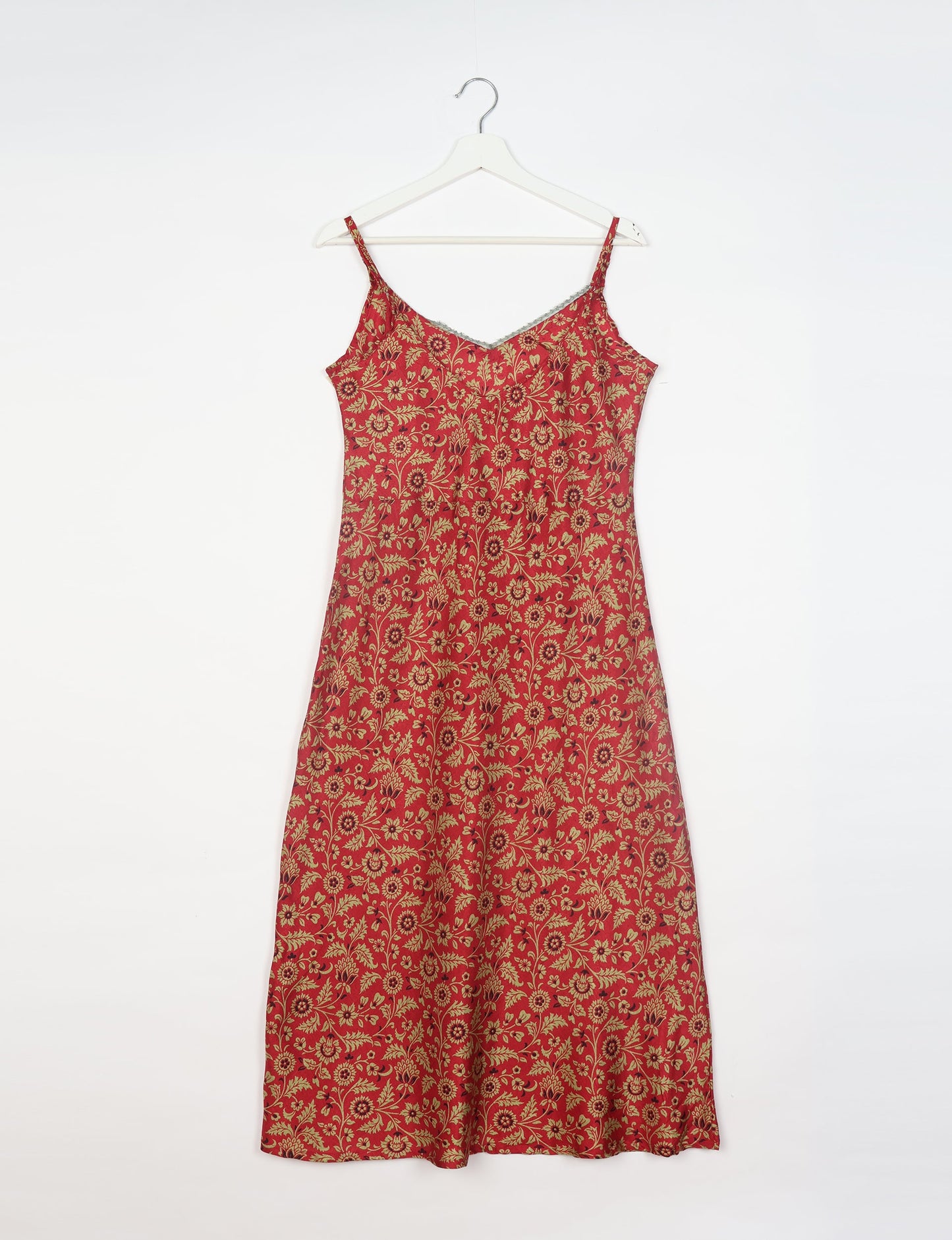 Spaghetti strap dress made from sustainable materials, embodying ethical fashion principles. Ideal for eco-friendly travelers seeking laid-back style.
