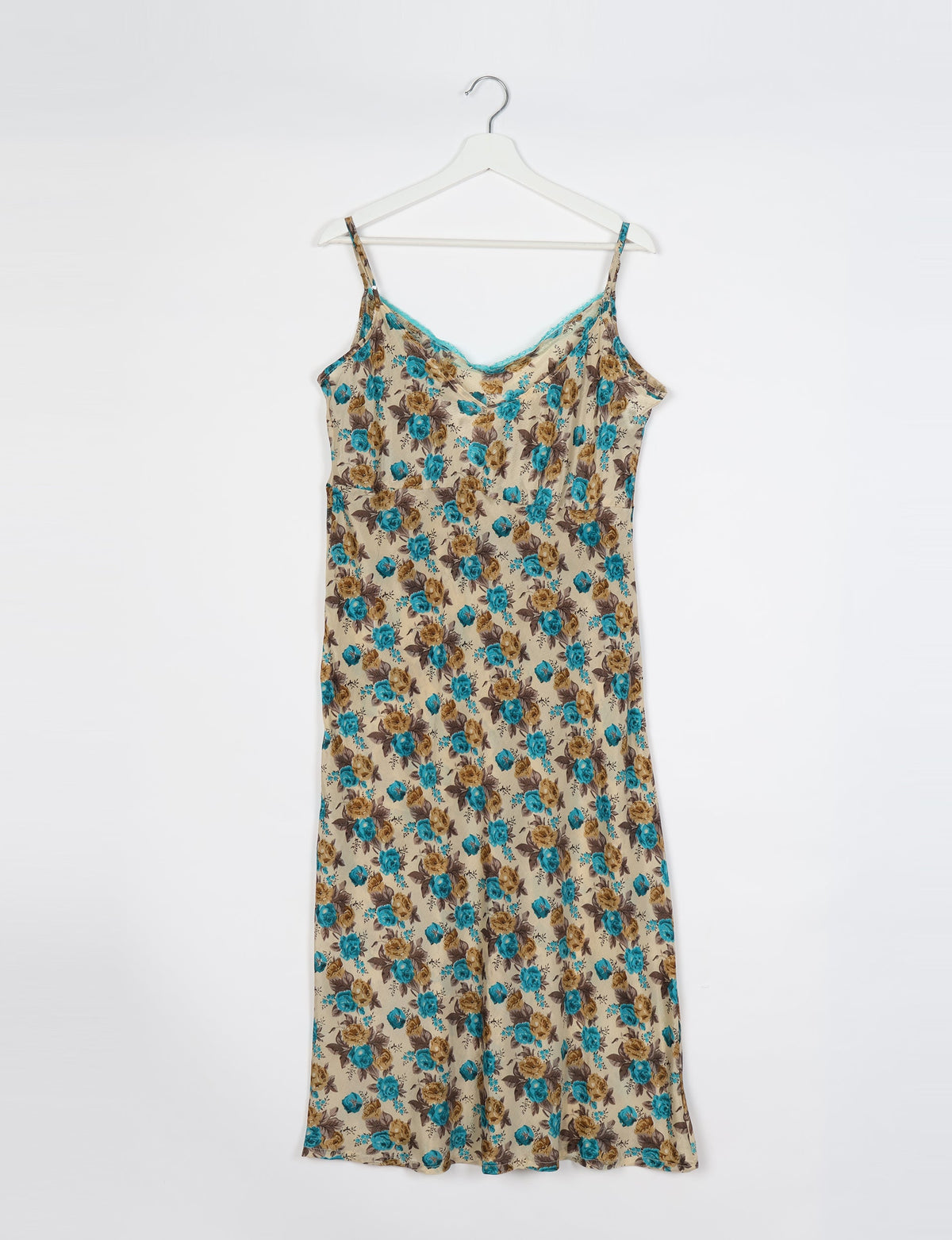 Spaghetti strap dress made from sustainable materials, embodying ethical fashion principles. Ideal for eco-friendly travelers seeking laid-back style.