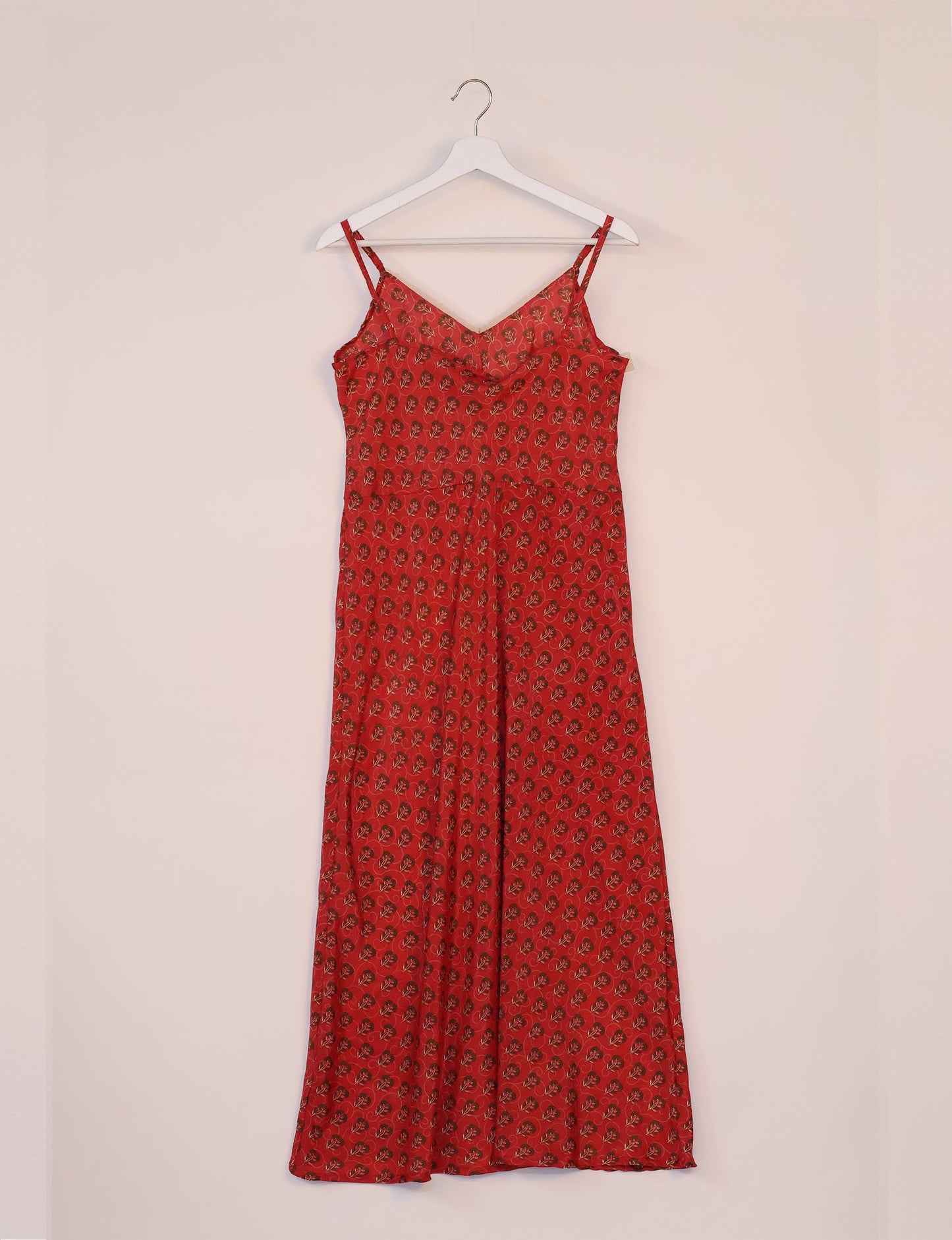 Spaghetti strap dress made from sustainable materials, embodying ethical fashion principles. Ideal for eco-friendly travelers seeking laid-back style.