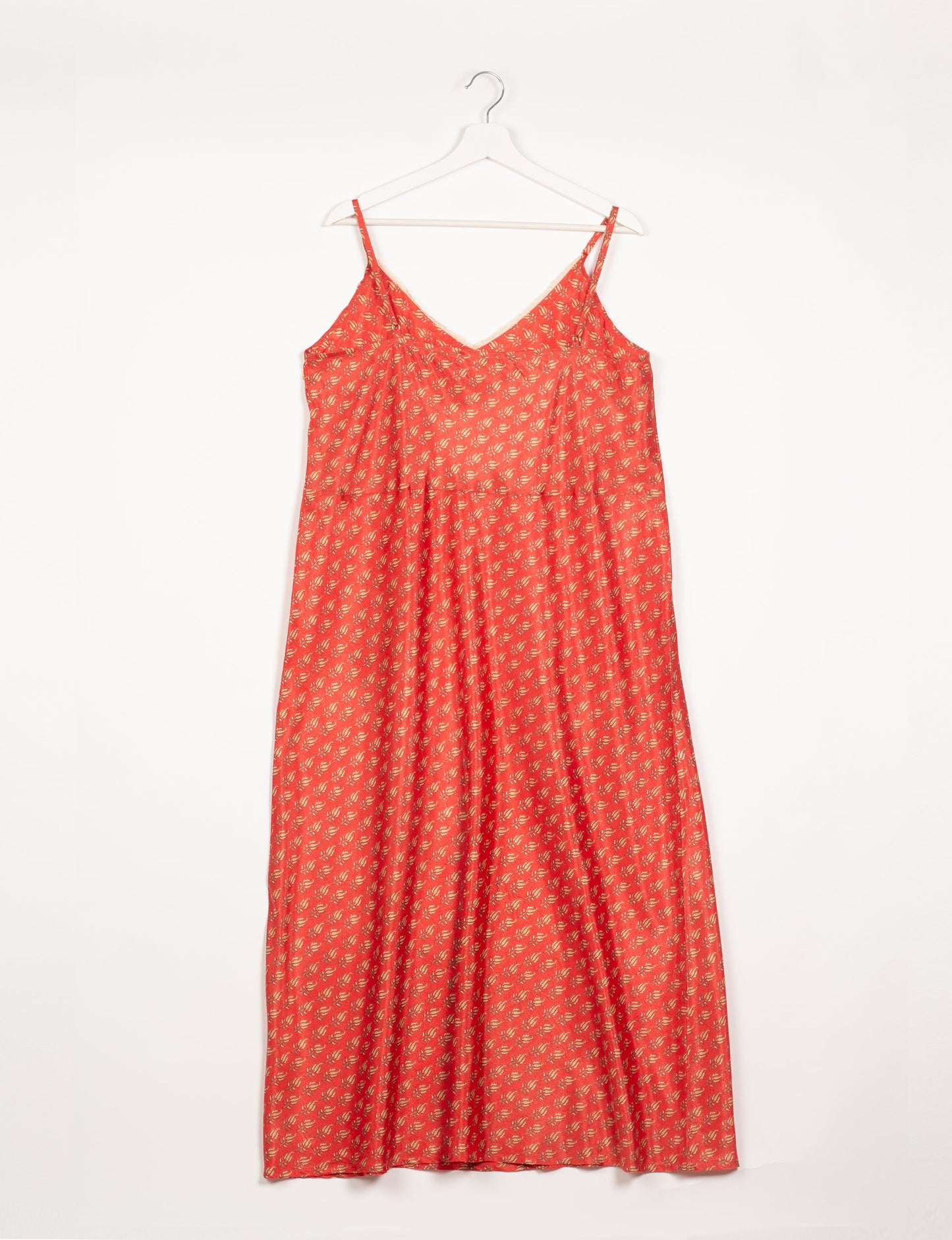 Spaghetti strap dress made from sustainable materials, embodying ethical fashion principles. Ideal for eco-friendly travelers seeking laid-back style.