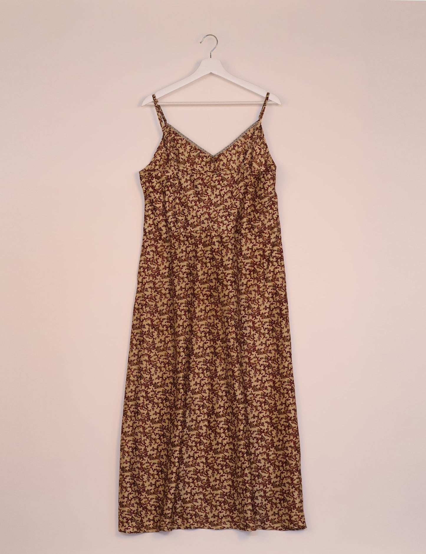 Spaghetti strap dress made from sustainable materials, embodying ethical fashion principles. Ideal for eco-friendly travelers seeking laid-back style.