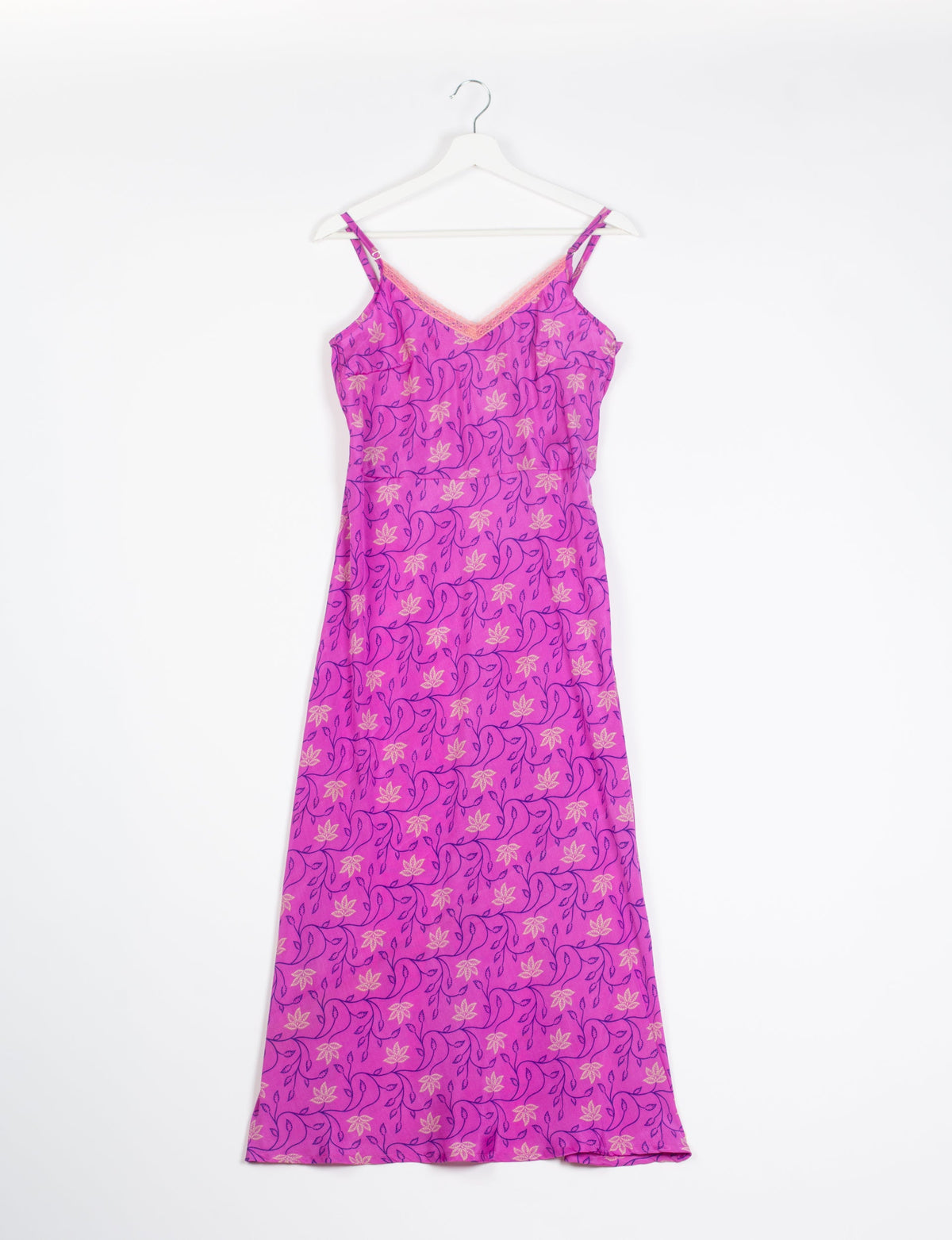 Spaghetti strap dress made from sustainable materials, embodying ethical fashion principles. Ideal for eco-friendly travelers seeking laid-back style.
