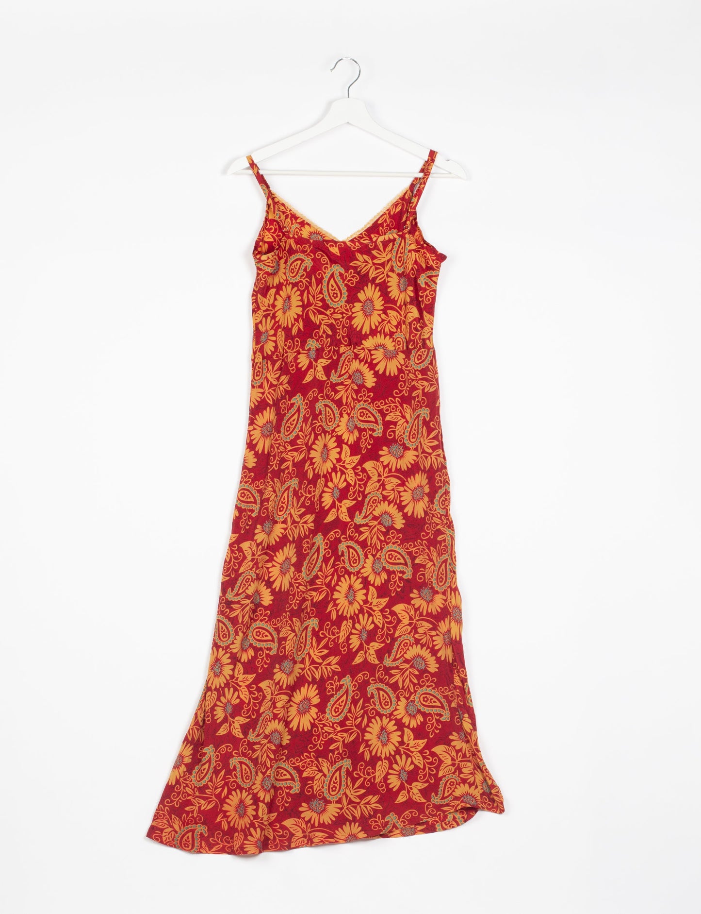 Spaghetti strap dress made from sustainable materials, embodying ethical fashion principles. Ideal for eco-friendly travelers seeking laid-back style.