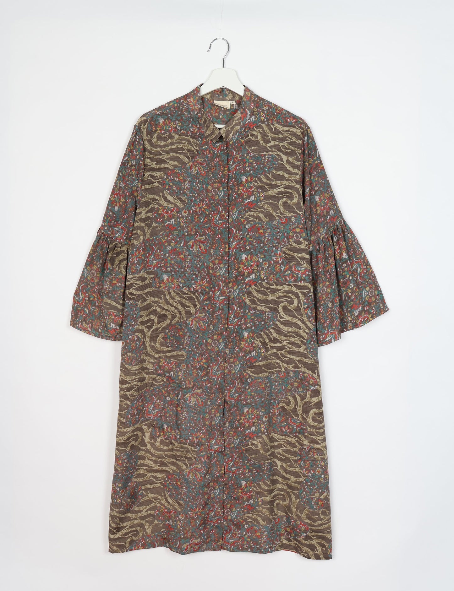 Discover ethical elegance with our Bell Sleeve Coat, handcrafted by Indian artisans from recycled materials. This sustainable fashion piece is a statement in eco-friendly clothing, combining style and consciousness effortlessly.