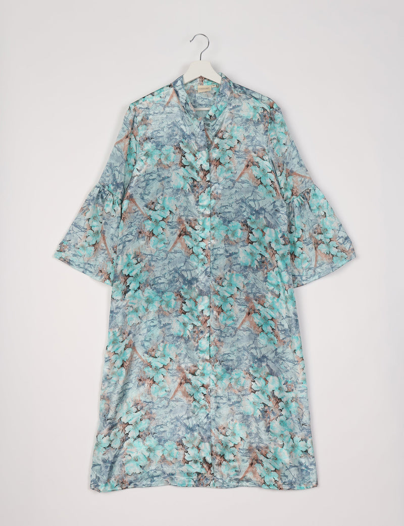 Blue floral bell sleeve coat with button front, standing collar, and loose fit, hanging on white hanger against white background