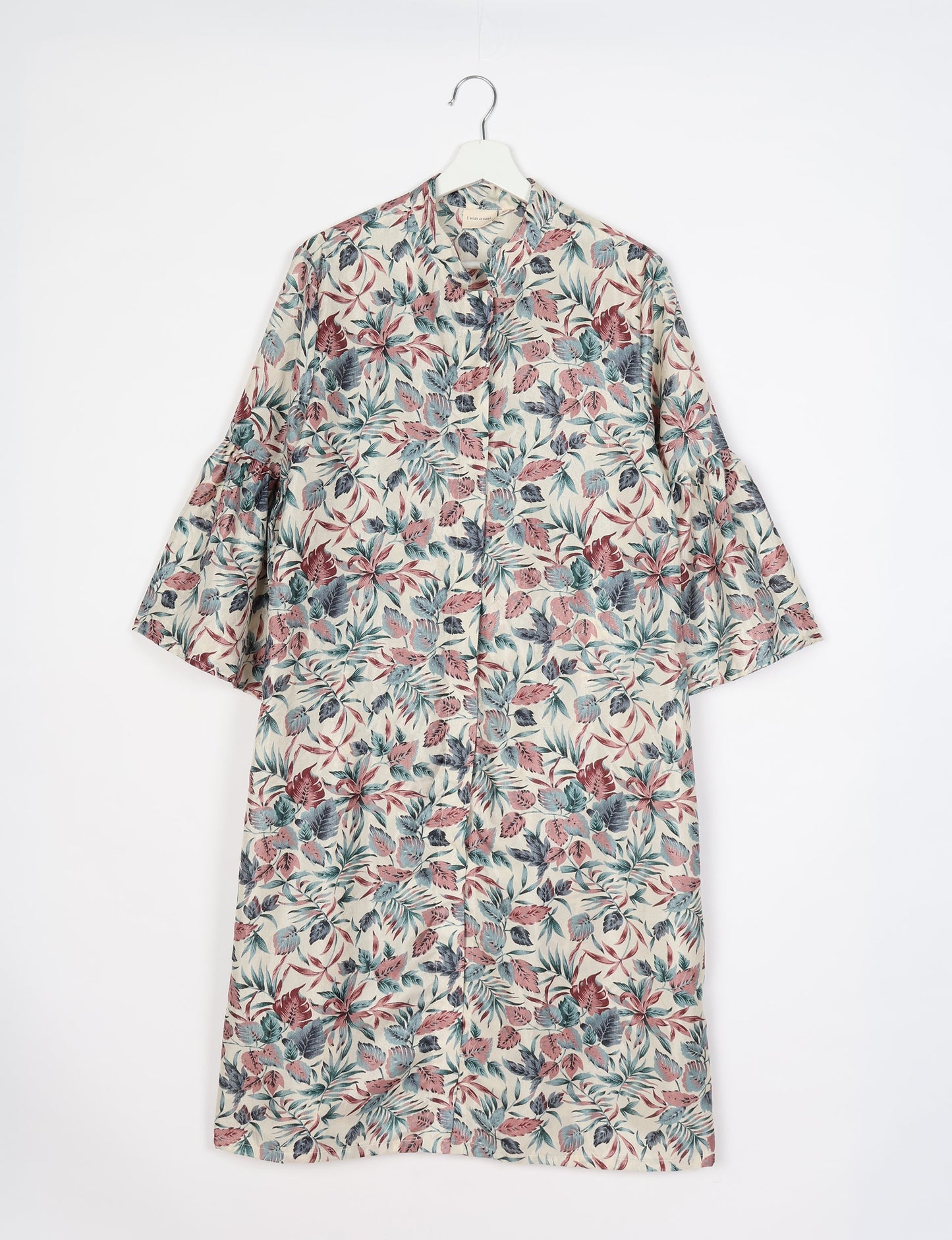 Discover ethical elegance with our Bell Sleeve Coat, handcrafted by Indian artisans from recycled materials. This sustainable fashion piece is a statement in eco-friendly clothing, combining style and consciousness effortlessly.