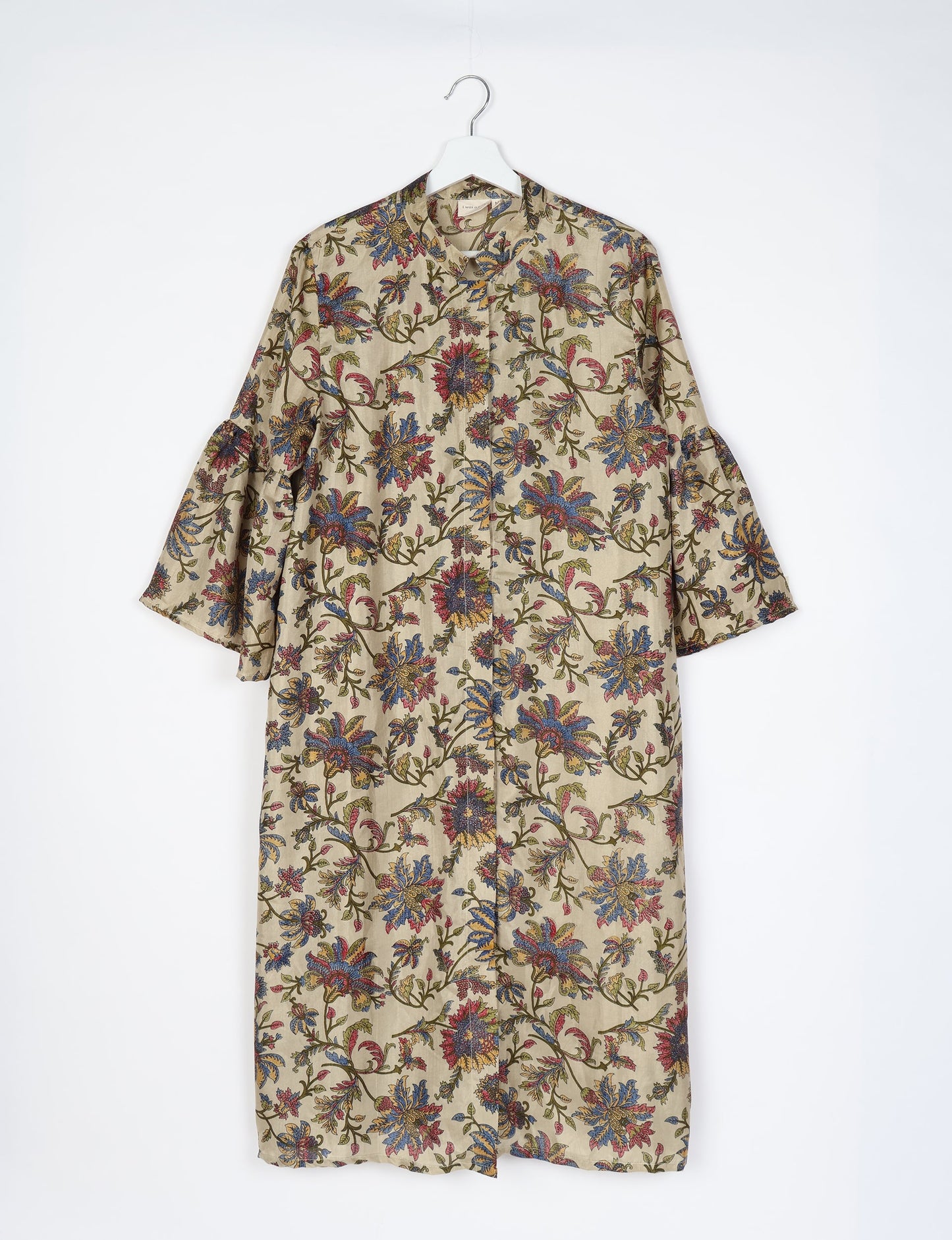 Discover ethical elegance with our Bell Sleeve Coat, handcrafted by Indian artisans from recycled materials. This sustainable fashion piece is a statement in eco-friendly clothing, combining style and consciousness effortlessly.