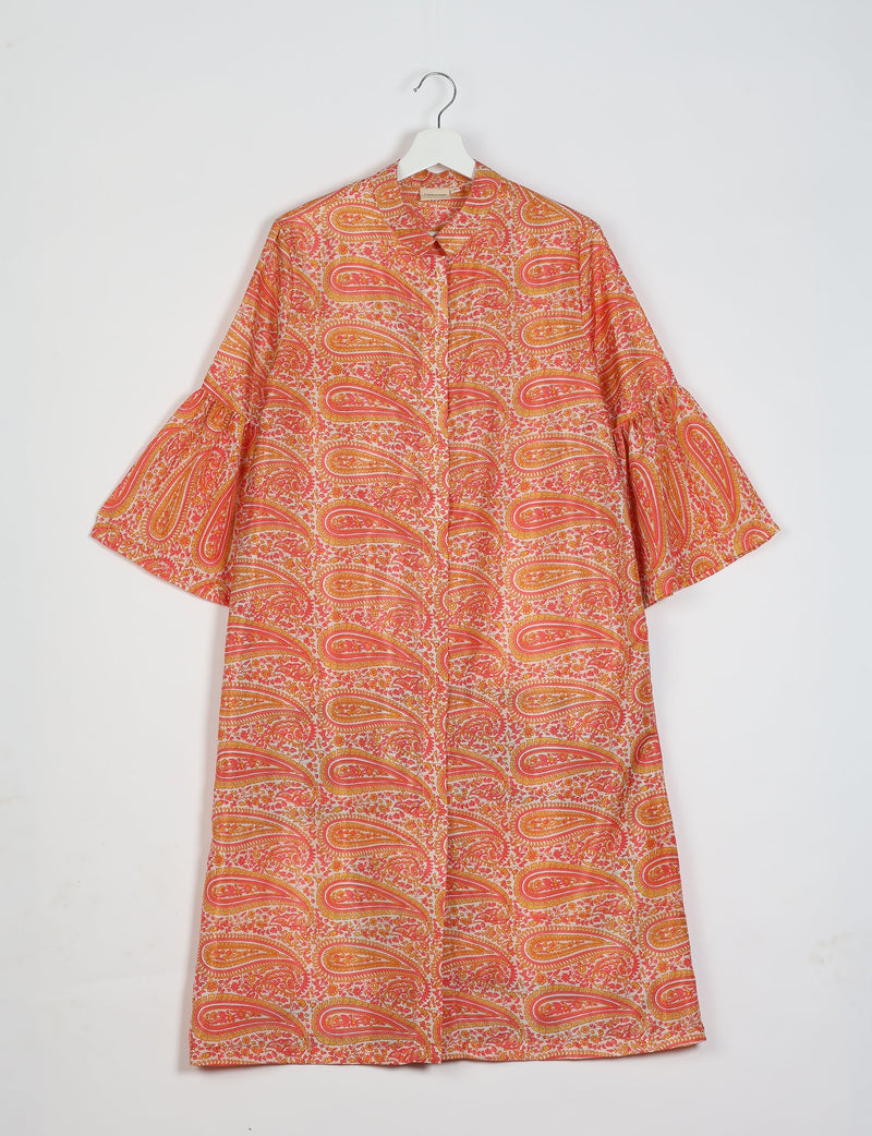 Orange paisley bell sleeve coat with front buttons, collar, and floral paisley pattern, shown hanging on white hanger