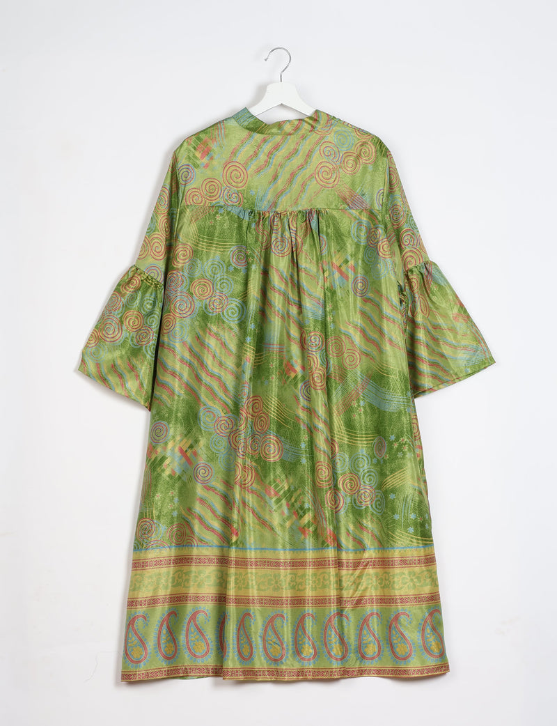 Green bell sleeve coat with abstract swirl and stripe patterns, paisley border, shown from back on white hanger