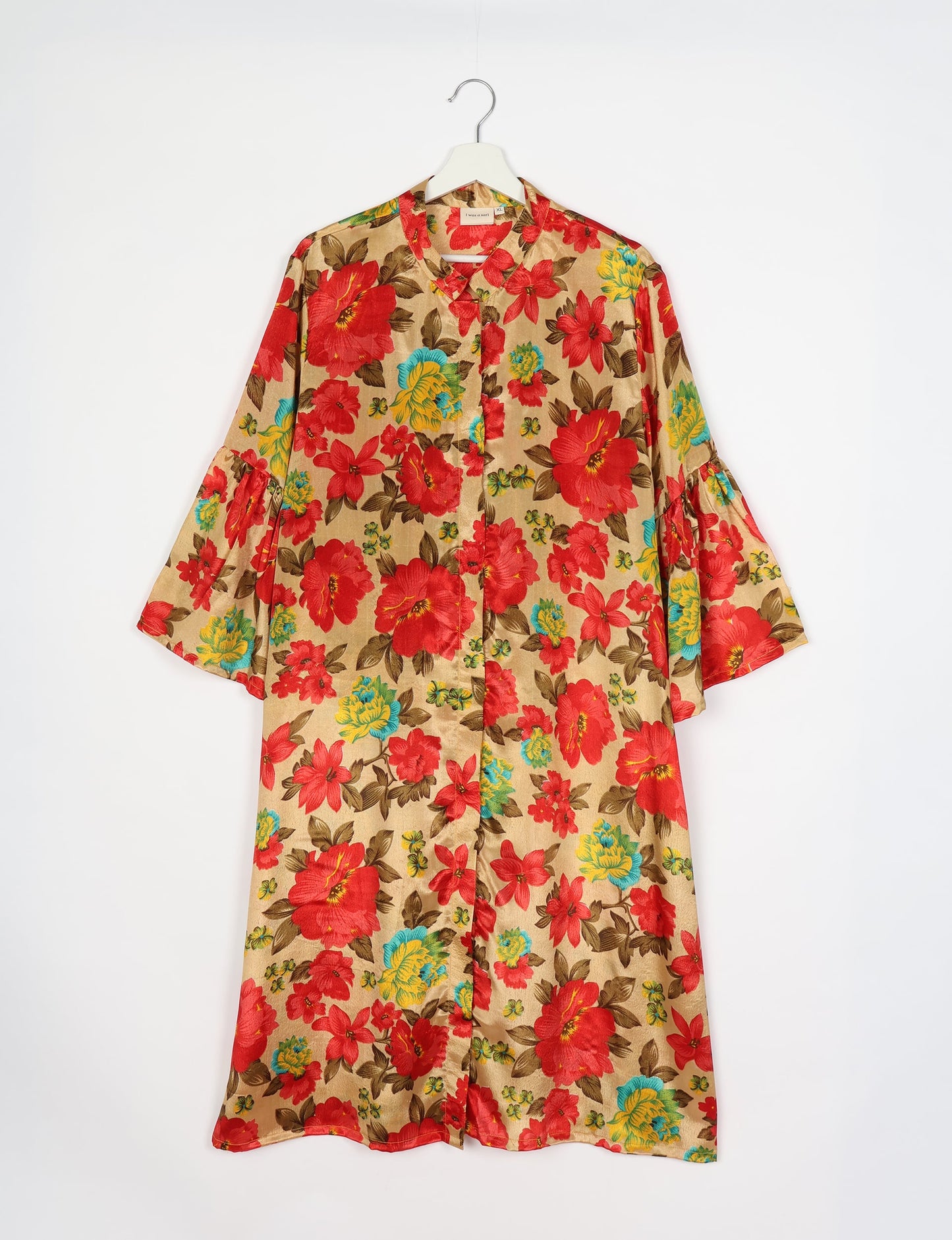 Discover ethical elegance with our Bell Sleeve Coat, handcrafted by Indian artisans from recycled materials. This sustainable fashion piece is a statement in eco-friendly clothing, combining style and consciousness effortlessly.