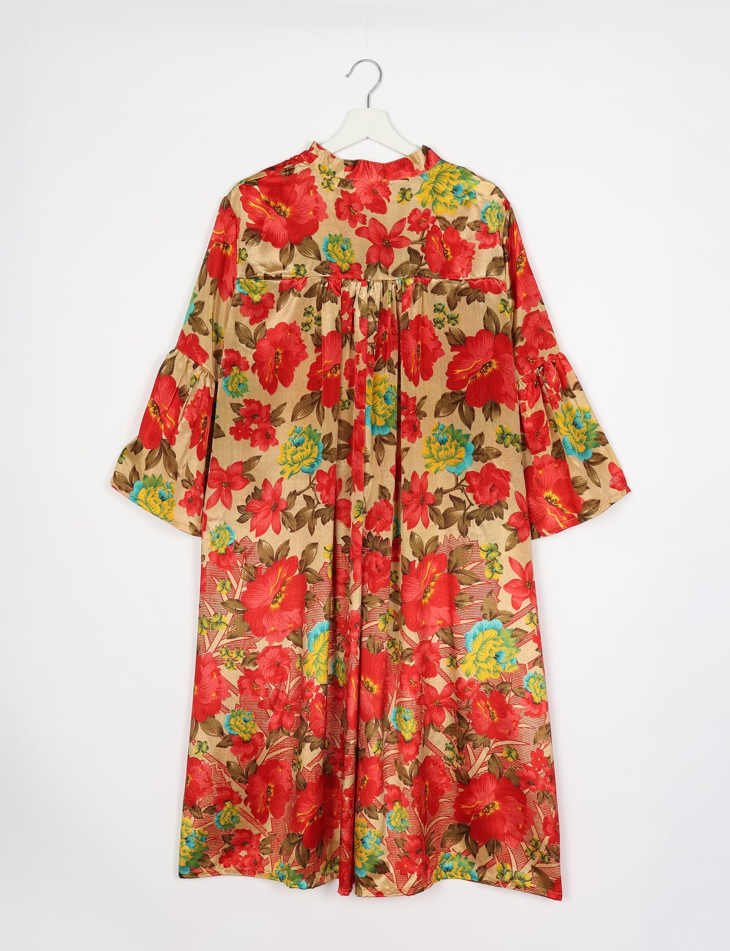 Discover ethical elegance with our Bell Sleeve Coat, handcrafted by Indian artisans from recycled materials. This sustainable fashion piece is a statement in eco-friendly clothing, combining style and consciousness effortlessly.