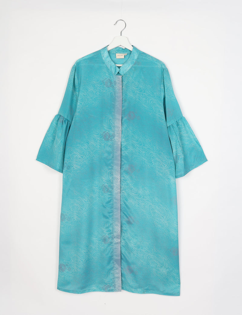 Blue abstract patterned bell sleeve coat with mandarin collar hanging on white hanger, front view