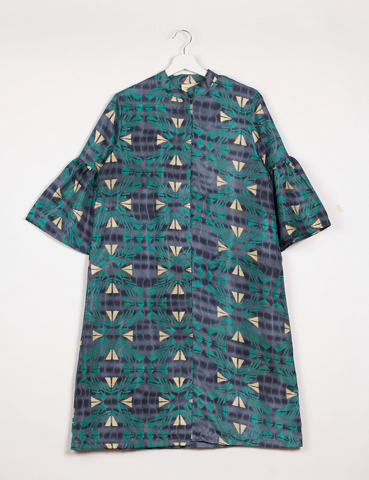 Blue geometric patterned bell sleeve coat with mandarin collar hanging on white hanger against white background