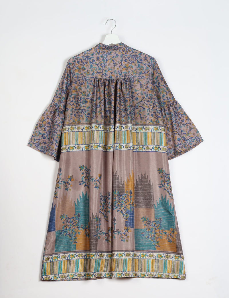 Grey tropical bell sleeve coat with floral and striped patterns, shown from the back on a hanger