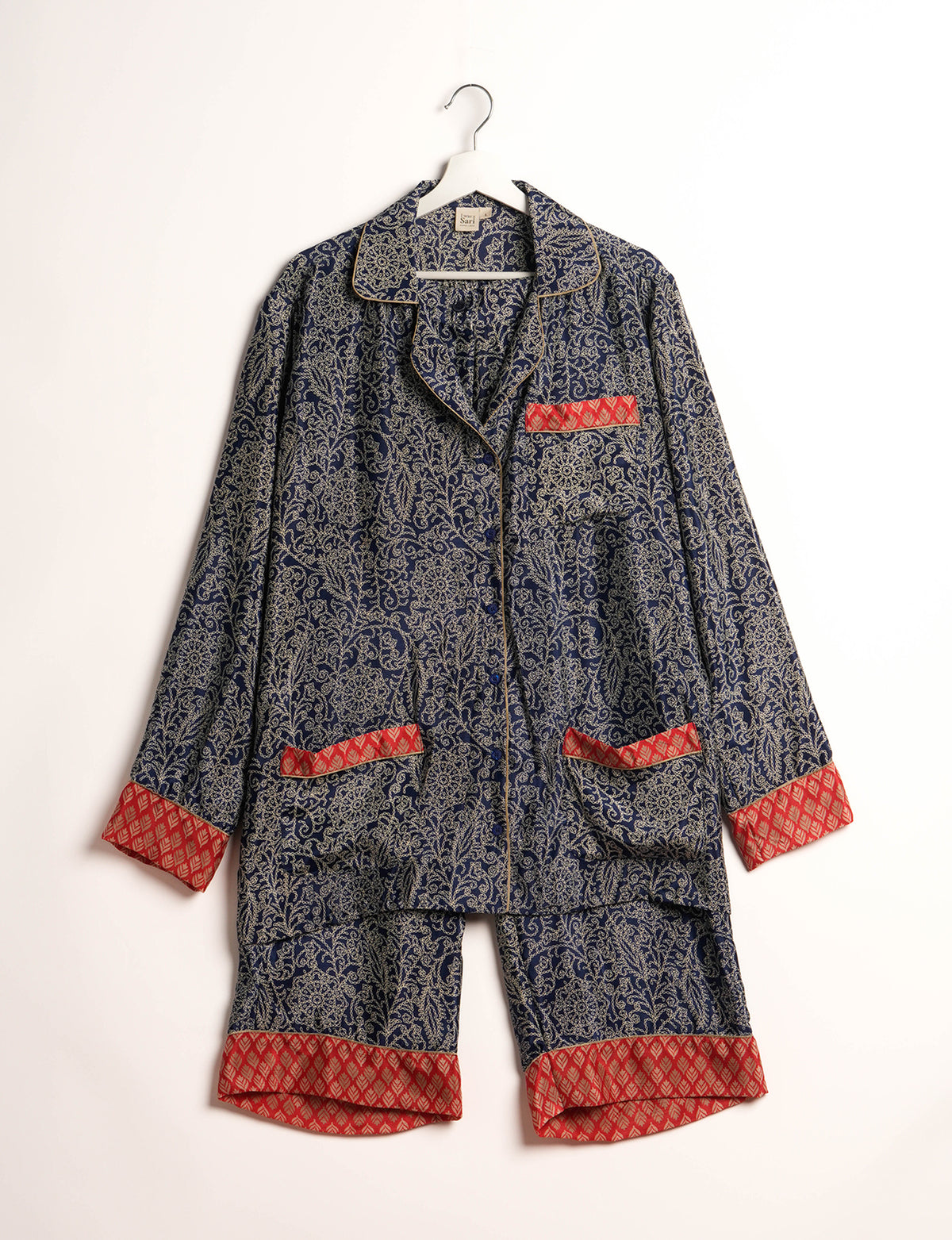 Choose sustainable sleepwear with our PJ SET – perfect for conscious living. From chilling to entertaining, these day-to-night pajamas feature an ethically crafted long-sleeve button-down and elastic-waist pants. Elevate your sleepwear with eco-friendly elegance.