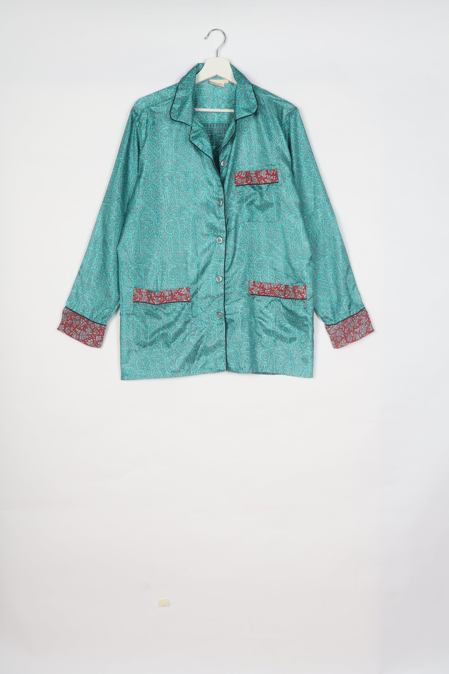 Choose sustainable sleepwear with our PJ SET – perfect for conscious living. From chilling to entertaining, these day-to-night pajamas feature an ethically crafted long-sleeve button-down and elastic-waist pants. Elevate your sleepwear with eco-friendly elegance.