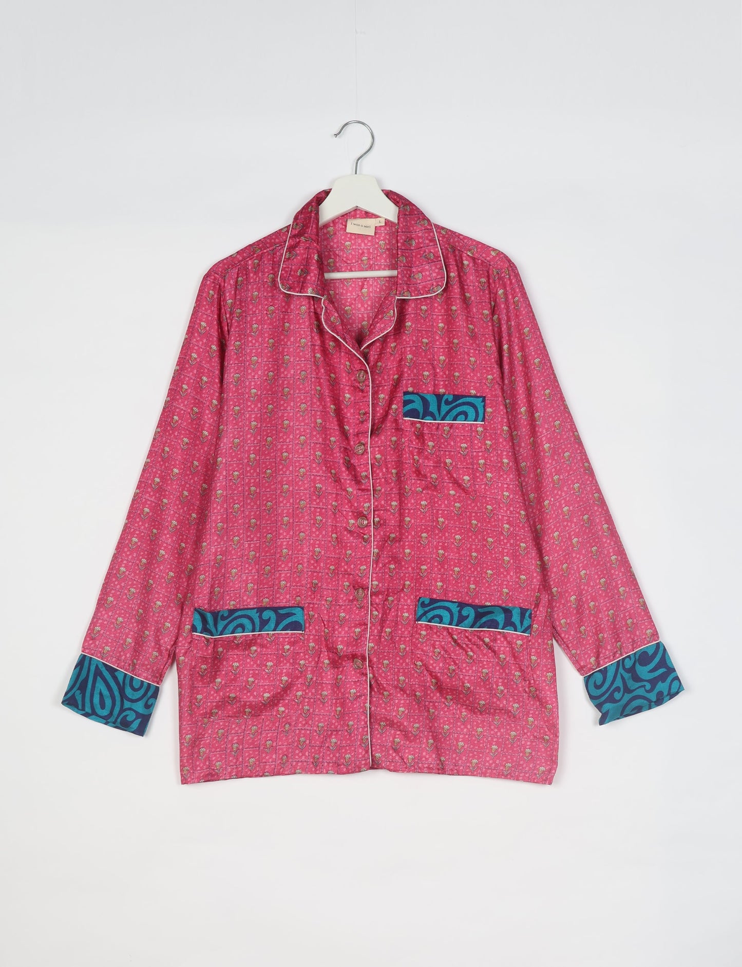 Choose sustainable sleepwear with our PJ SET – perfect for conscious living. From chilling to entertaining, these day-to-night pajamas feature an ethically crafted long-sleeve button-down and elastic-waist pants. Elevate your sleepwear with eco-friendly elegance.