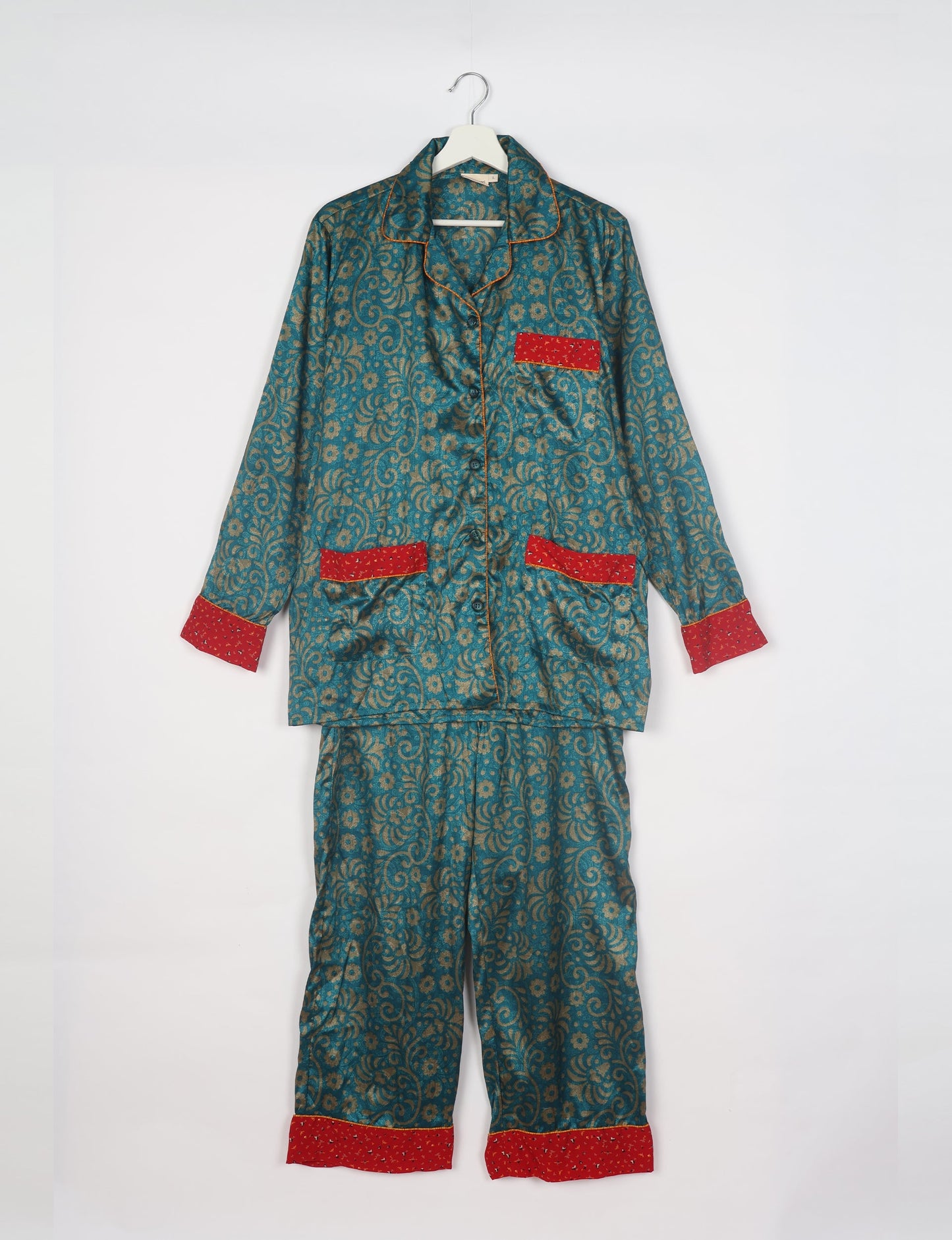 Choose sustainable sleepwear with our PJ SET – perfect for conscious living. From chilling to entertaining, these day-to-night pajamas feature an ethically crafted long-sleeve button-down and elastic-waist pants. Elevate your sleepwear with eco-friendly elegance.