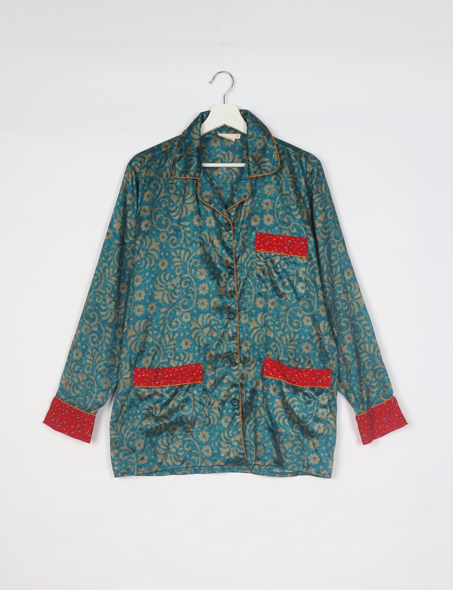 Choose sustainable sleepwear with our PJ SET – perfect for conscious living. From chilling to entertaining, these day-to-night pajamas feature an ethically crafted long-sleeve button-down and elastic-waist pants. Elevate your sleepwear with eco-friendly elegance.