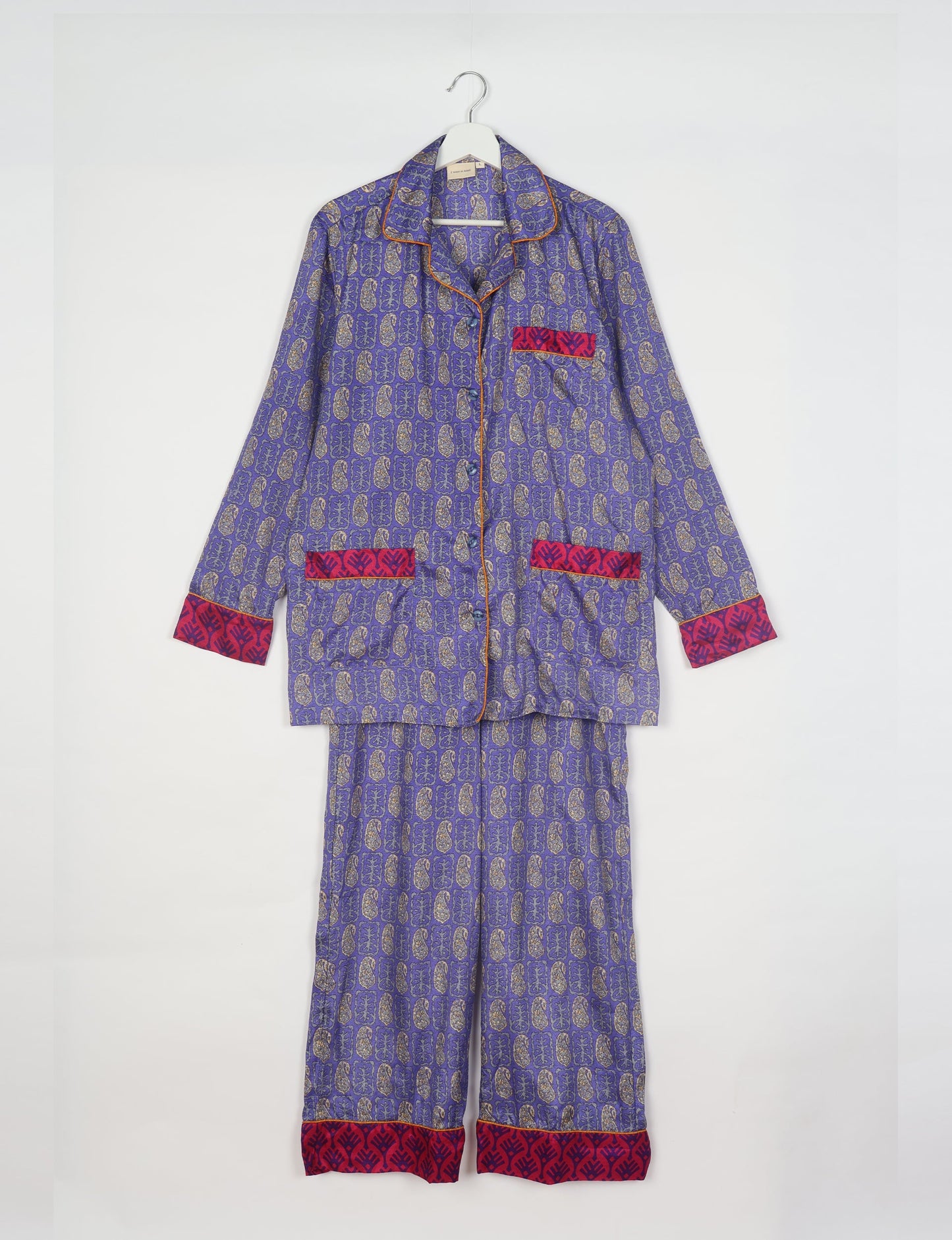 Choose sustainable sleepwear with our PJ SET – perfect for conscious living. From chilling to entertaining, these day-to-night pajamas feature an ethically crafted long-sleeve button-down and elastic-waist pants. Elevate your sleepwear with eco-friendly elegance.