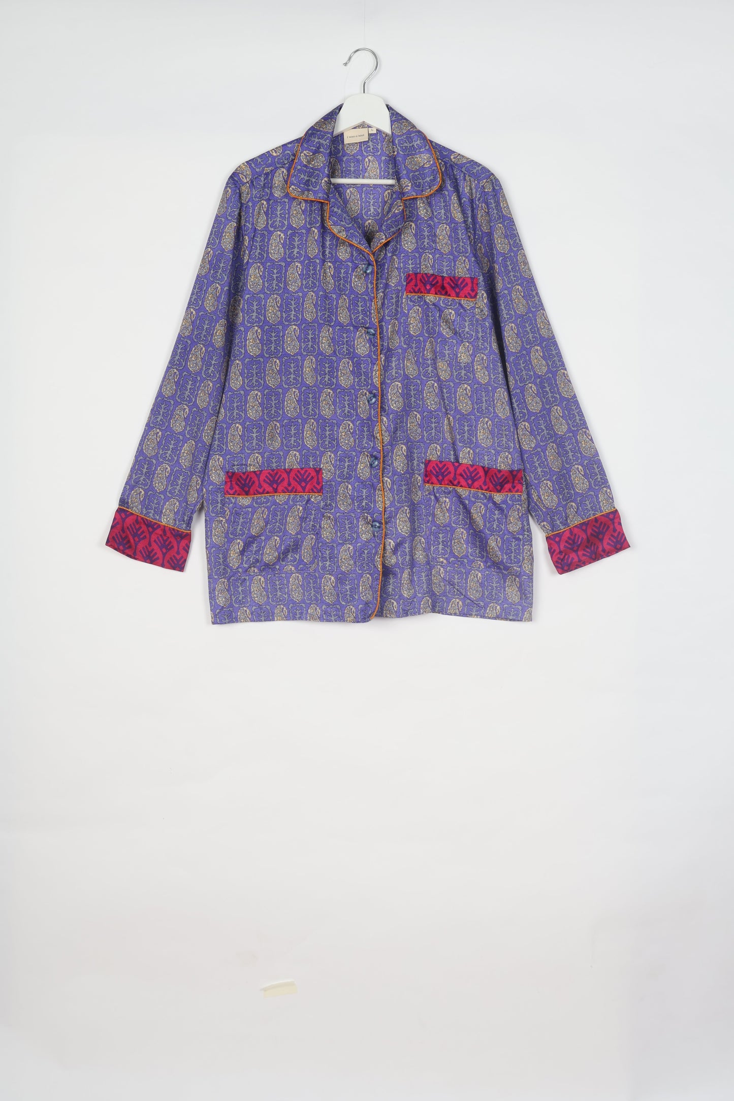 Choose sustainable sleepwear with our PJ SET – perfect for conscious living. From chilling to entertaining, these day-to-night pajamas feature an ethically crafted long-sleeve button-down and elastic-waist pants. Elevate your sleepwear with eco-friendly elegance.