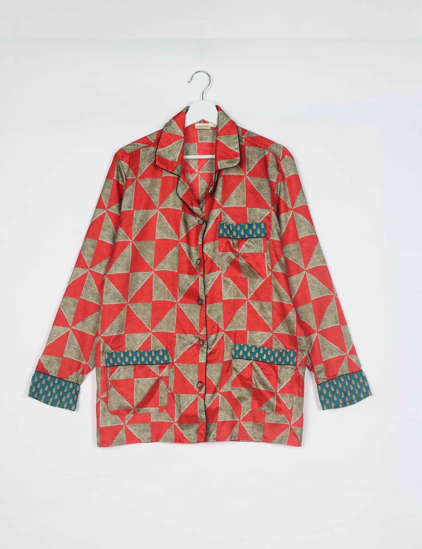 Choose sustainable sleepwear with our PJ SET – perfect for conscious living. From chilling to entertaining, these day-to-night pajamas feature an ethically crafted long-sleeve button-down and elastic-waist pants. Elevate your sleepwear with eco-friendly elegance.