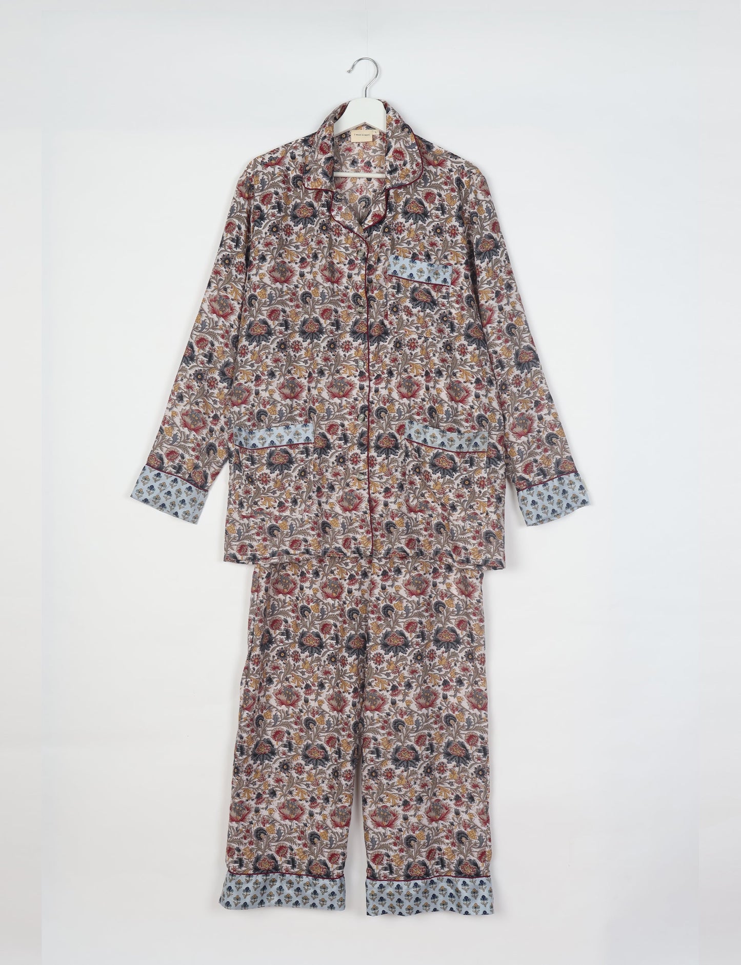 Choose sustainable sleepwear with our PJ SET – perfect for conscious living. From chilling to entertaining, these day-to-night pajamas feature an ethically crafted long-sleeve button-down and elastic-waist pants. Elevate your sleepwear with eco-friendly elegance.