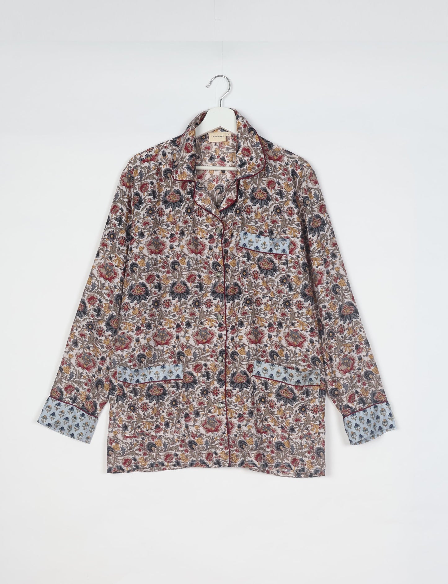 Choose sustainable sleepwear with our PJ SET – perfect for conscious living. From chilling to entertaining, these day-to-night pajamas feature an ethically crafted long-sleeve button-down and elastic-waist pants. Elevate your sleepwear with eco-friendly elegance.