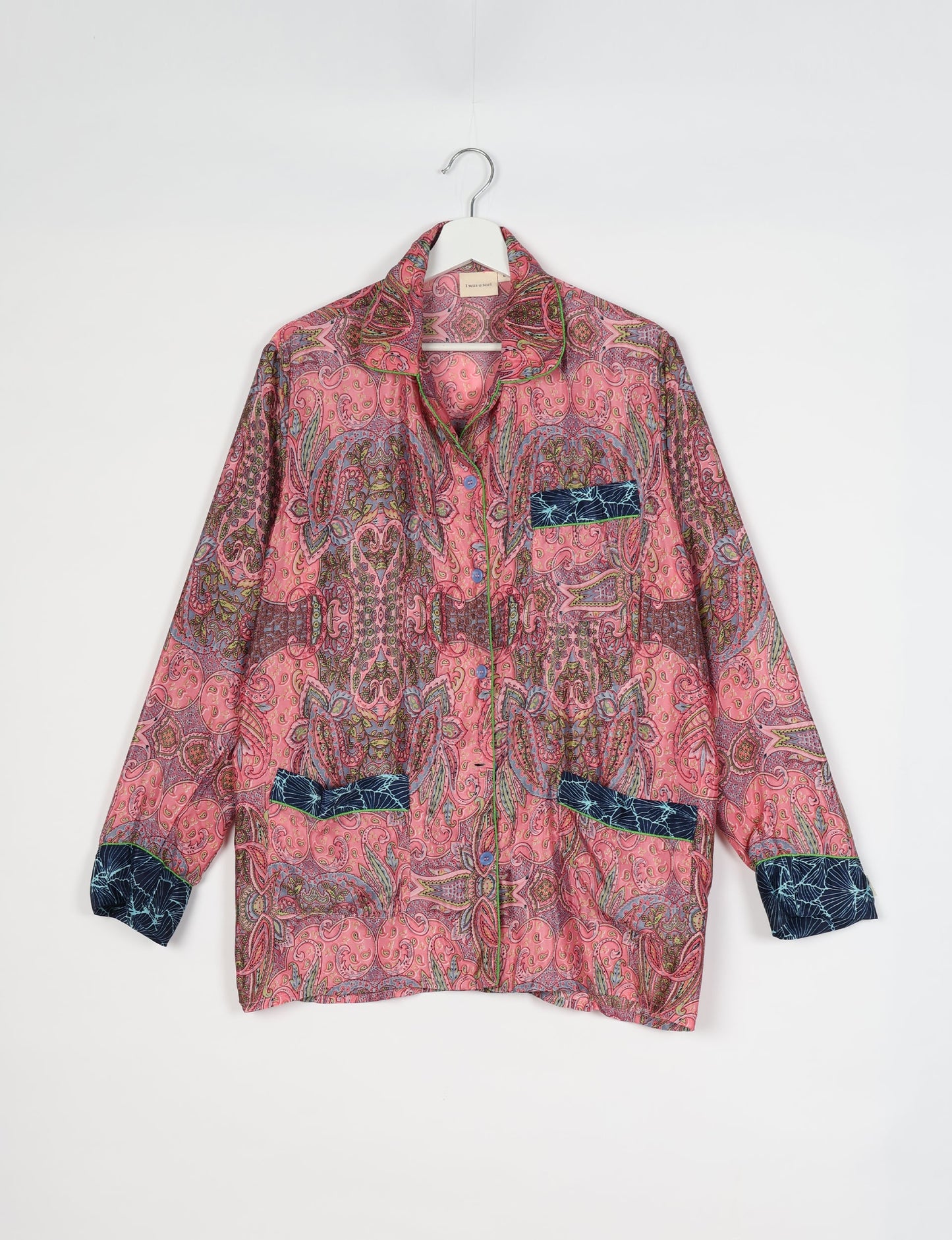 Chic long-sleeve pajama set made from recycled materials, representing eco friendly products, repurposed clothing, and zero waste clothing in green fashion.