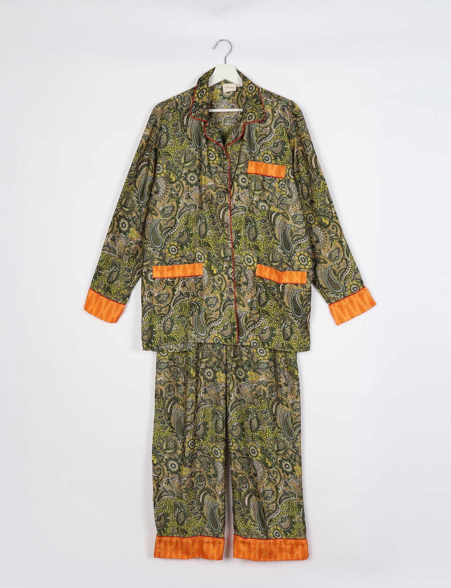 Chic long-sleeve pajama set made from recycled materials, representing eco friendly products, repurposed clothing, and zero waste clothing in green fashion.