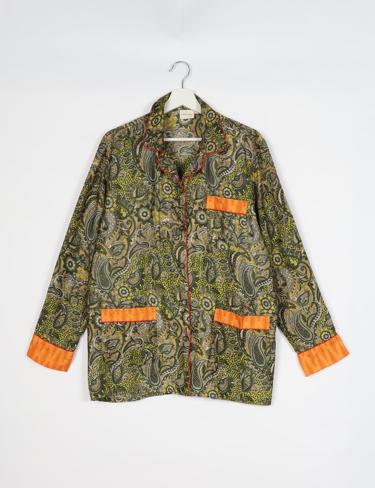 Chic long-sleeve pajama set made from recycled materials, representing eco friendly products, repurposed clothing, and zero waste clothing in green fashion.