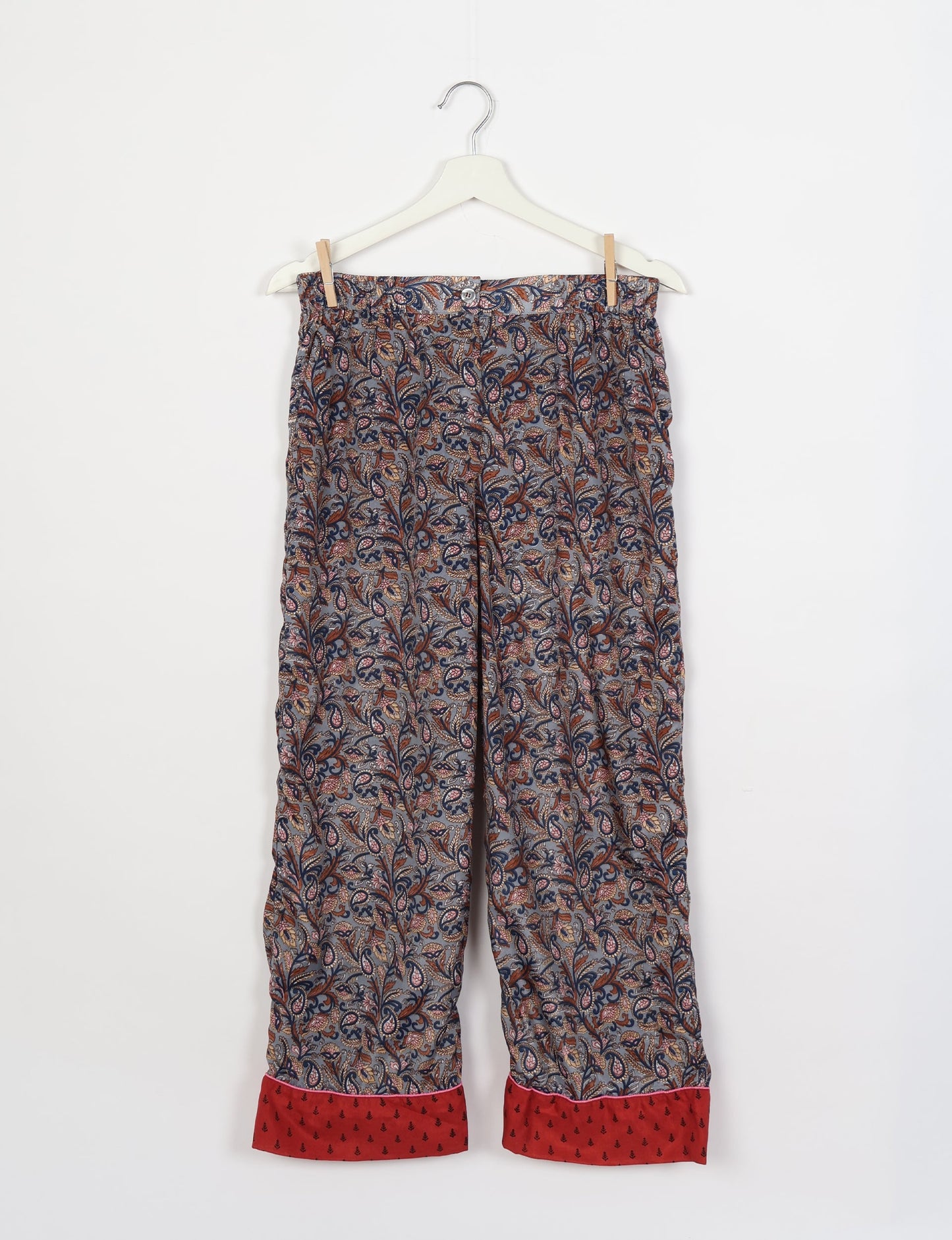 Chic long-sleeve pajama set made from recycled materials, representing eco friendly products, repurposed clothing, and zero waste clothing in green fashion.