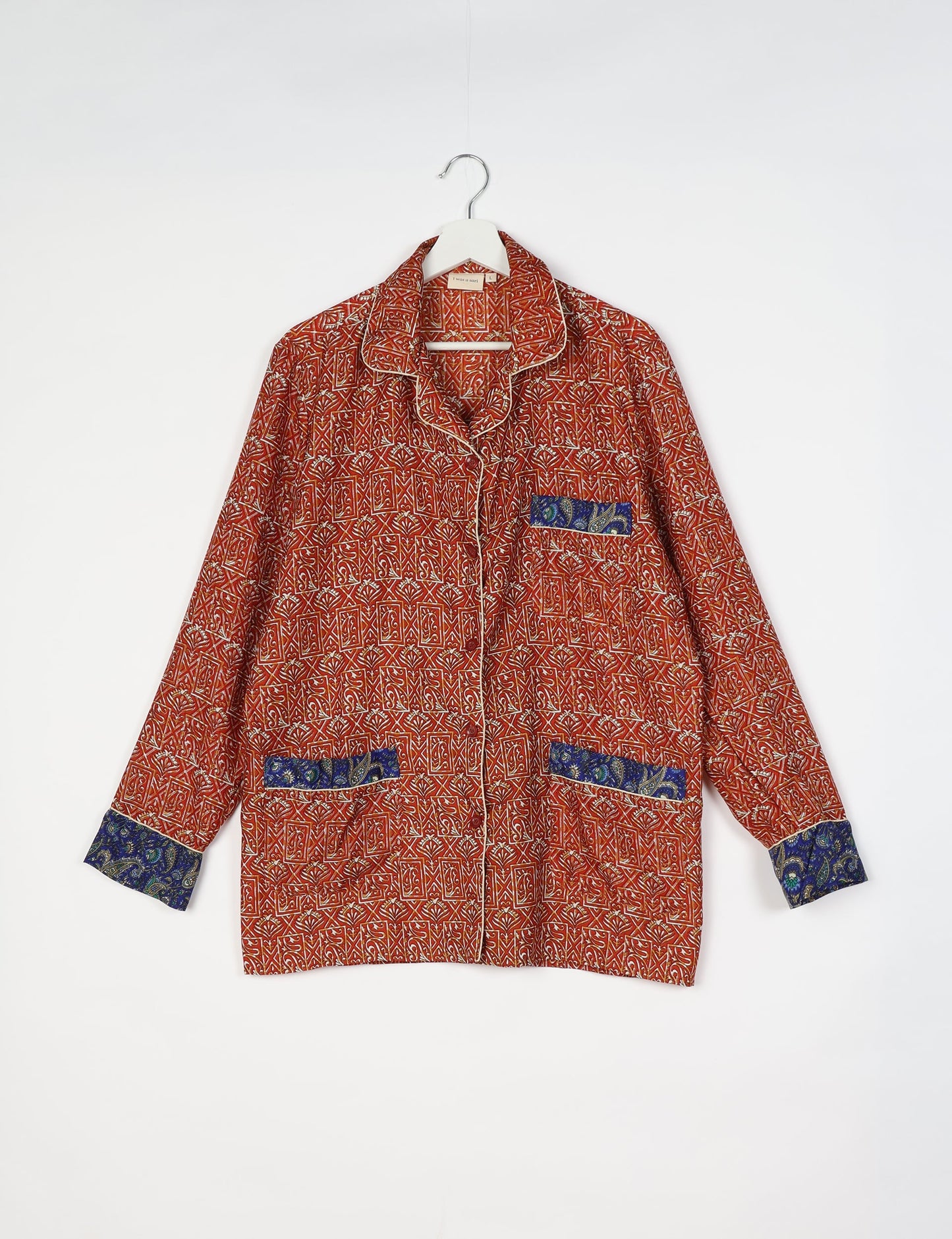 Chic long-sleeve pajama set made from recycled materials, representing eco friendly products, repurposed clothing, and zero waste clothing in green fashion.