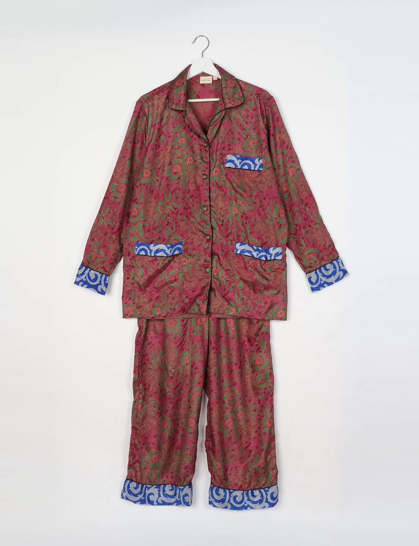 Chic long-sleeve pajama set made from recycled materials, representing eco friendly products, repurposed clothing, and zero waste clothing in green fashion.