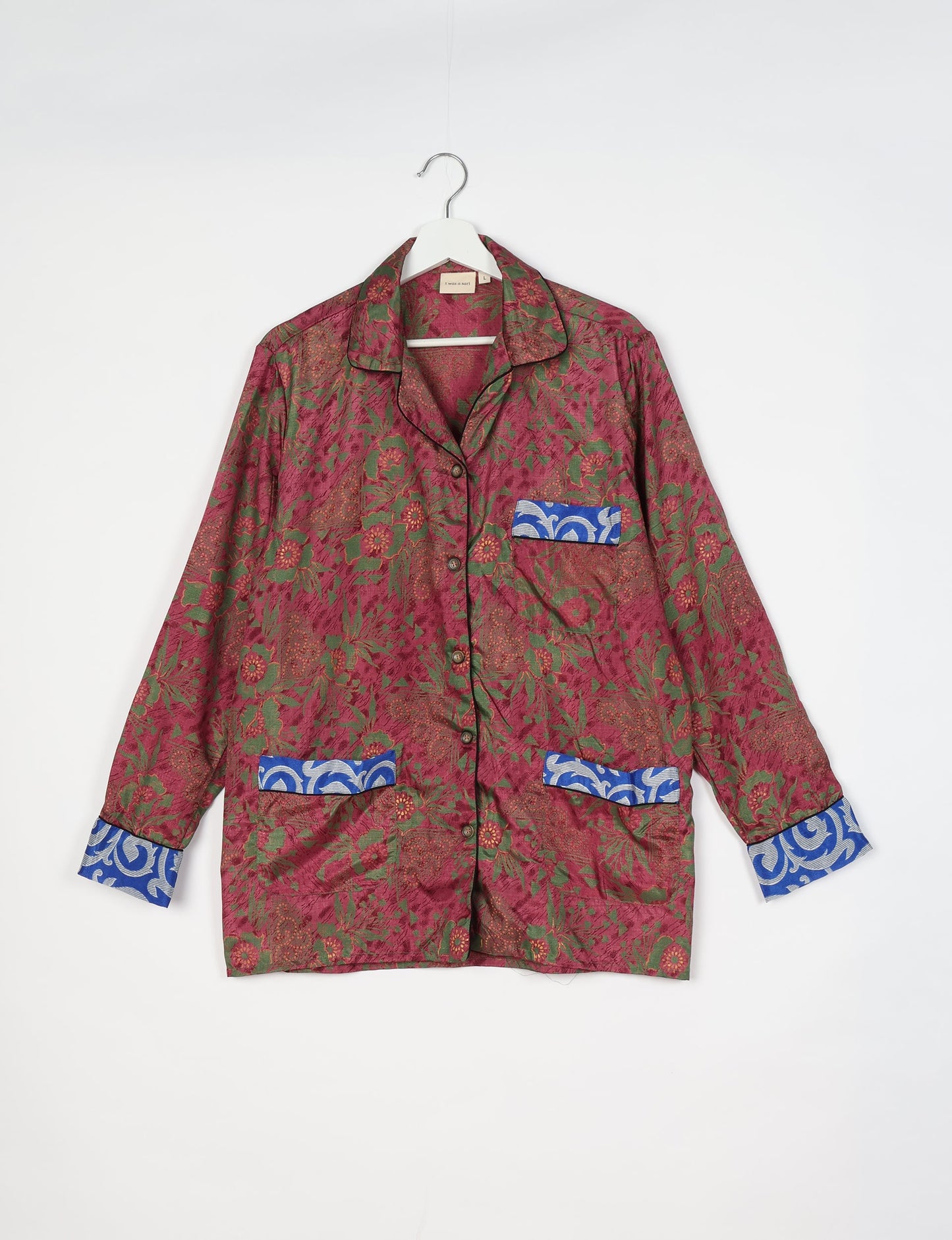 Chic long-sleeve pajama set made from recycled materials, representing eco friendly products, repurposed clothing, and zero waste clothing in green fashion.