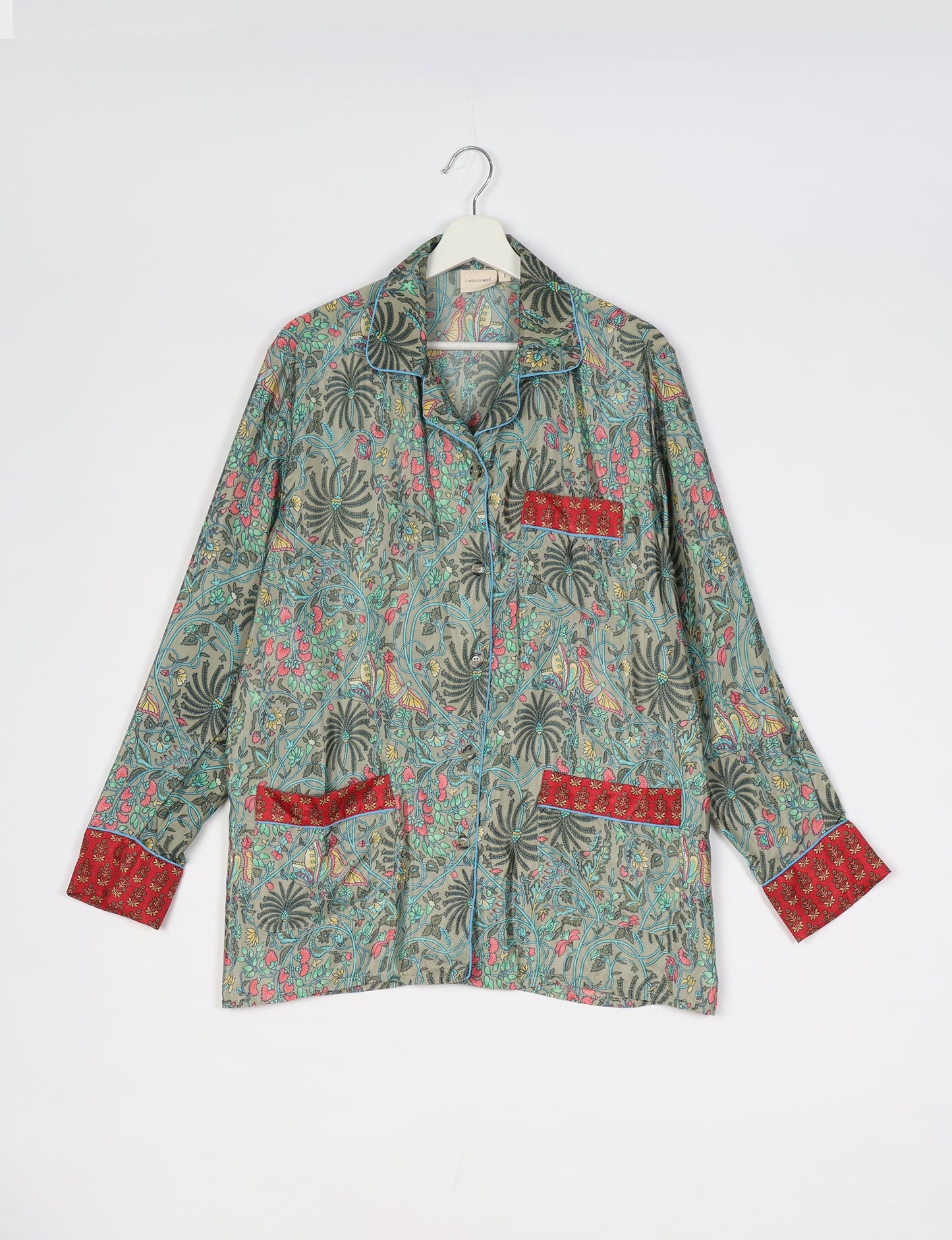 Chic long-sleeve pajama set made from recycled materials, representing eco friendly products, repurposed clothing, and zero waste clothing in green fashion.