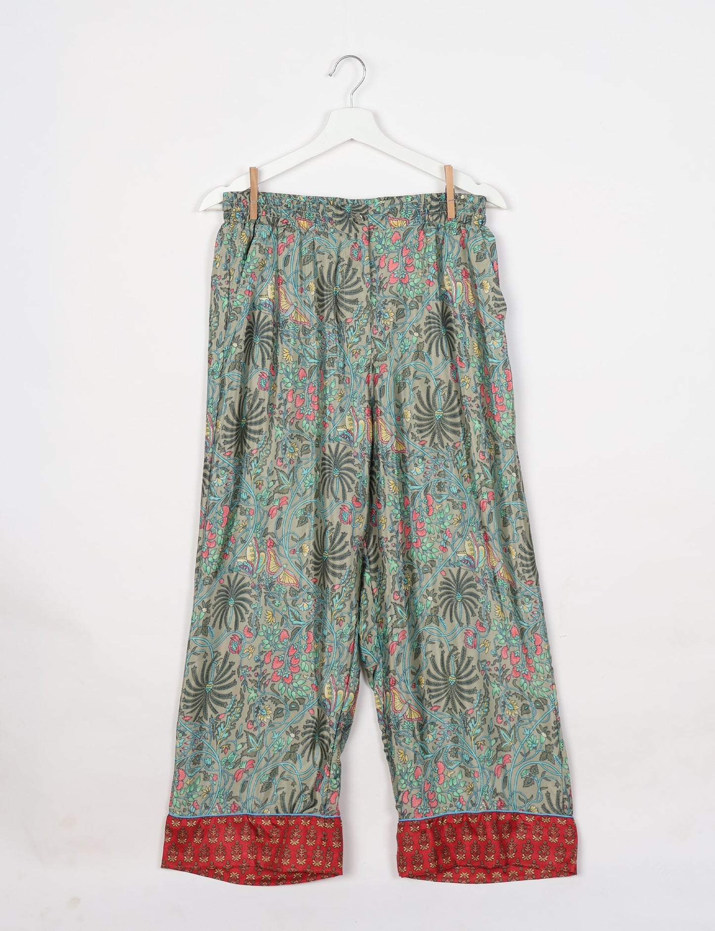 Chic long-sleeve pajama set made from recycled materials, representing eco friendly products, repurposed clothing, and zero waste clothing in green fashion.