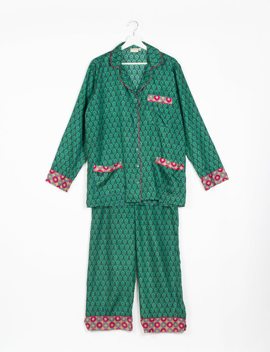 Choose sustainable sleepwear with our PJ SET – perfect for conscious living. From chilling to entertaining, these day-to-night pajamas feature an ethically crafted long-sleeve button-down and elastic-waist pants. Elevate your sleepwear with eco-friendly elegance.