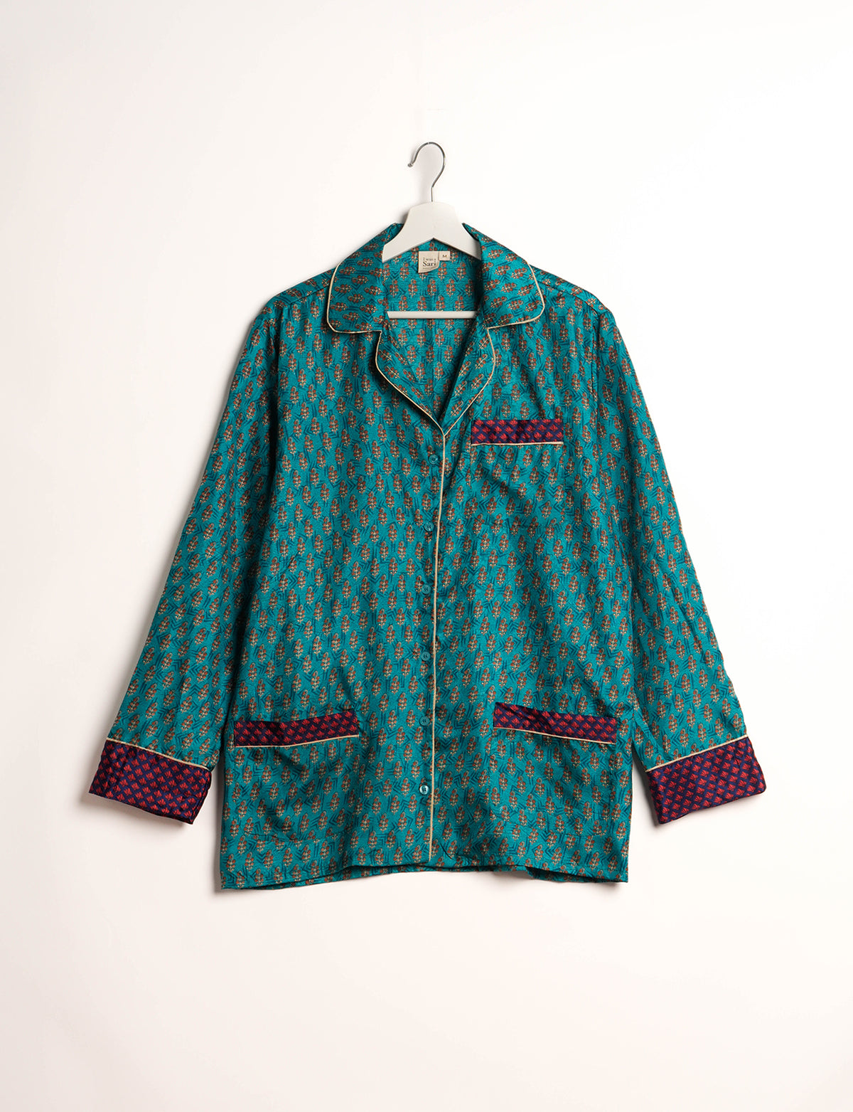 Choose sustainable sleepwear with our PJ SET – perfect for conscious living. From chilling to entertaining, these day-to-night pajamas feature an ethically crafted long-sleeve button-down and elastic-waist pants. Elevate your sleepwear with eco-friendly elegance.