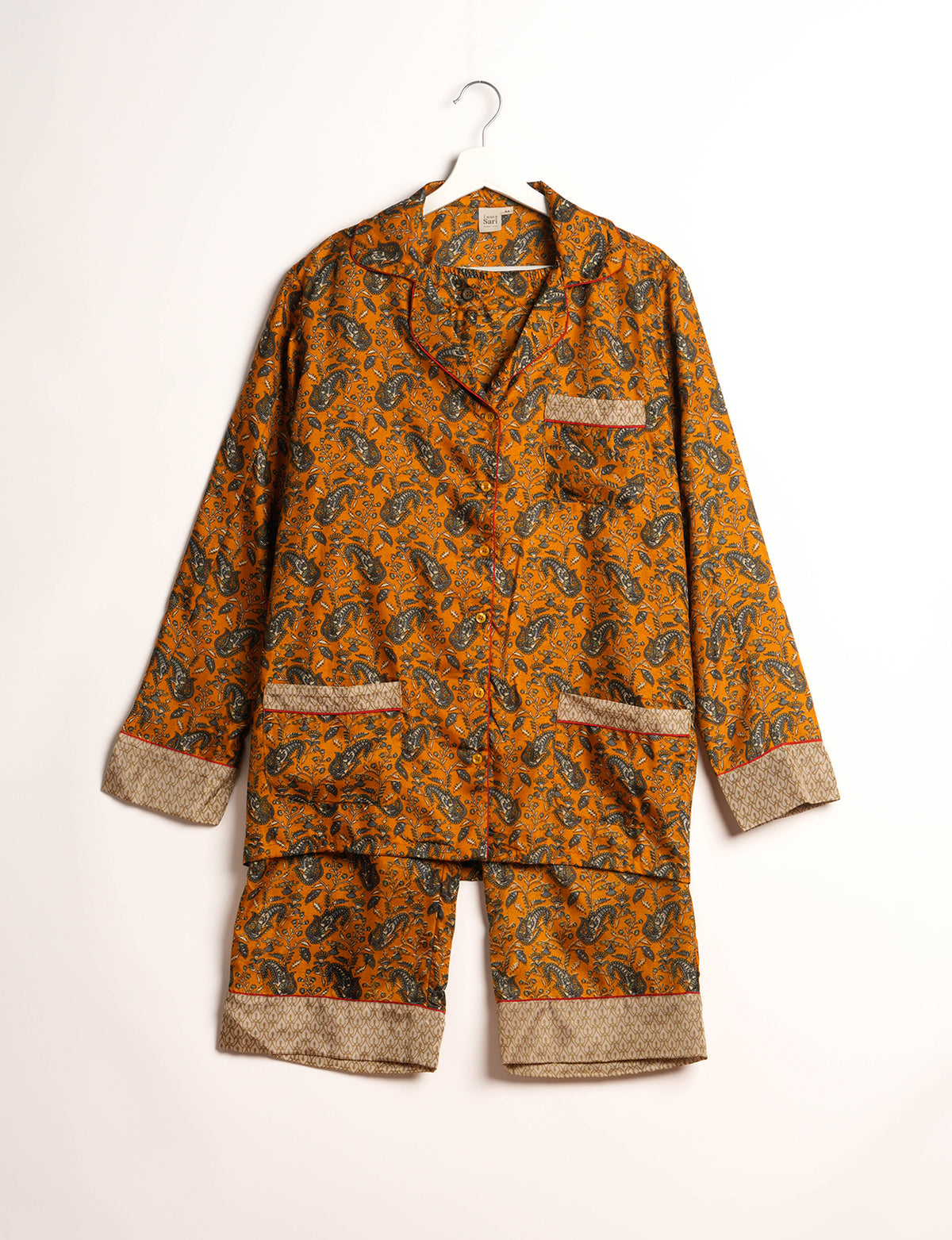 Choose sustainable sleepwear with our PJ SET – perfect for conscious living. From chilling to entertaining, these day-to-night pajamas feature an ethically crafted long-sleeve button-down and elastic-waist pants. Elevate your sleepwear with eco-friendly elegance.