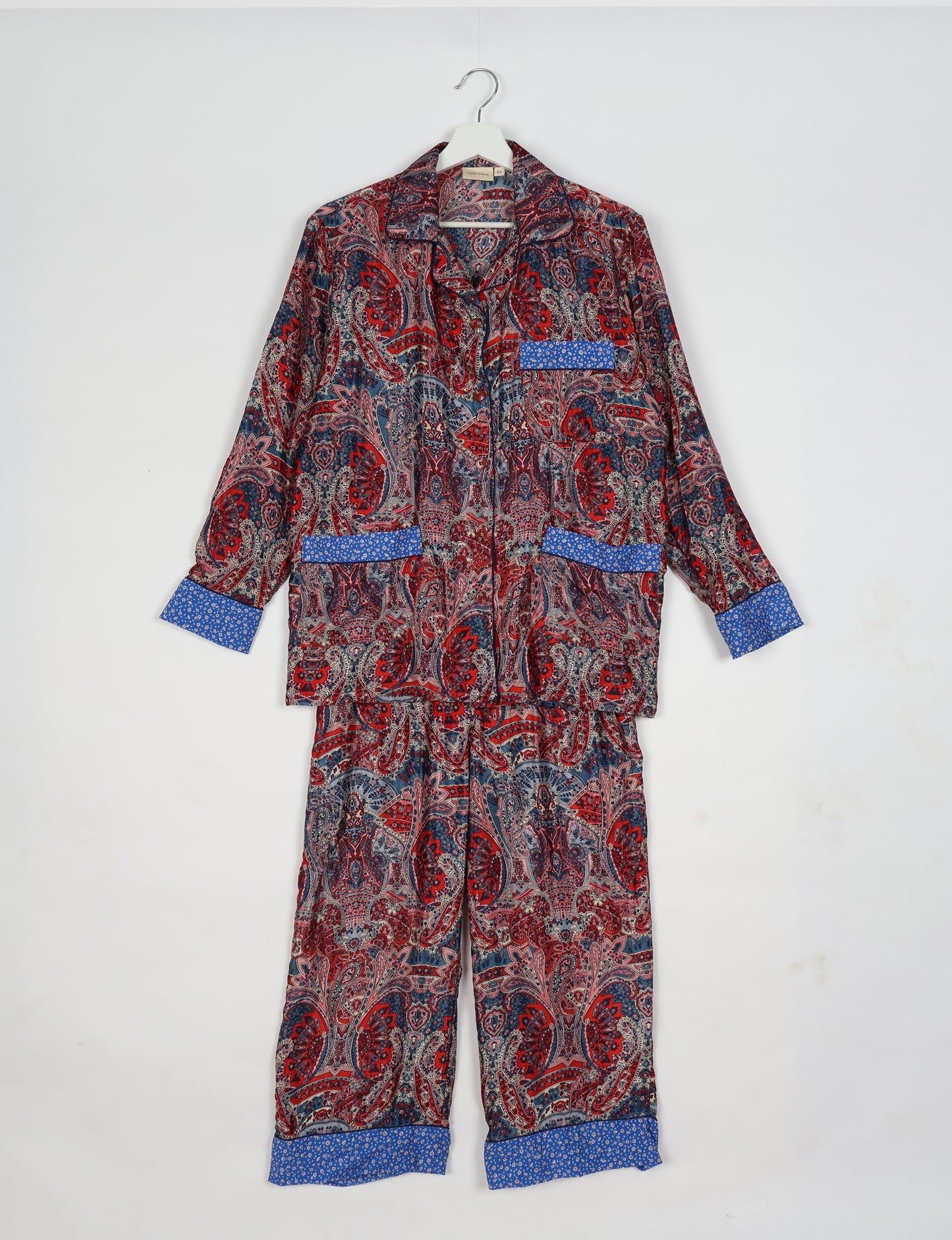 Chic long-sleeve pajama set made from recycled materials, representing eco friendly products, repurposed clothing, and zero waste clothing in green fashion.