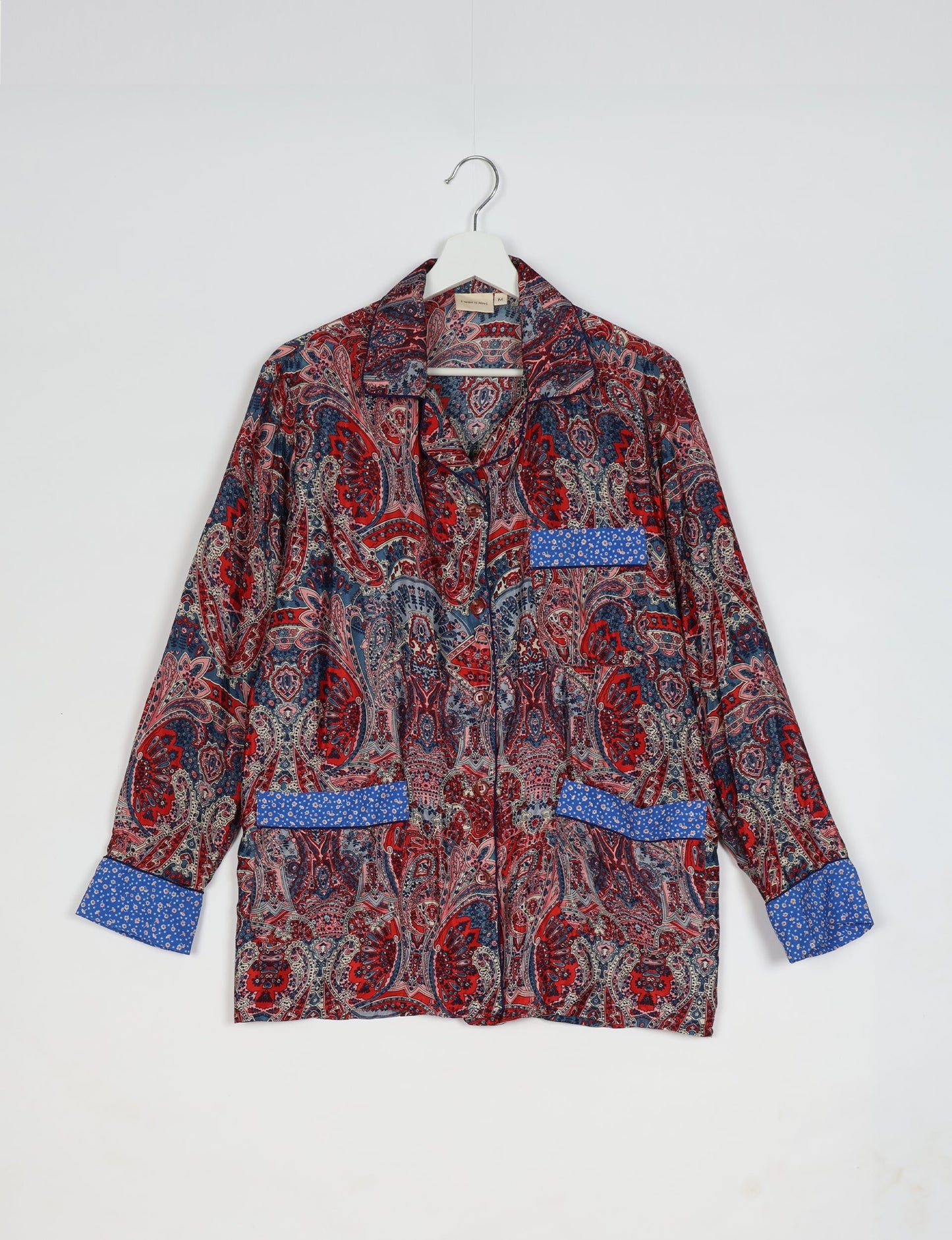 Chic long-sleeve pajama set made from recycled materials, representing eco friendly products, repurposed clothing, and zero waste clothing in green fashion.