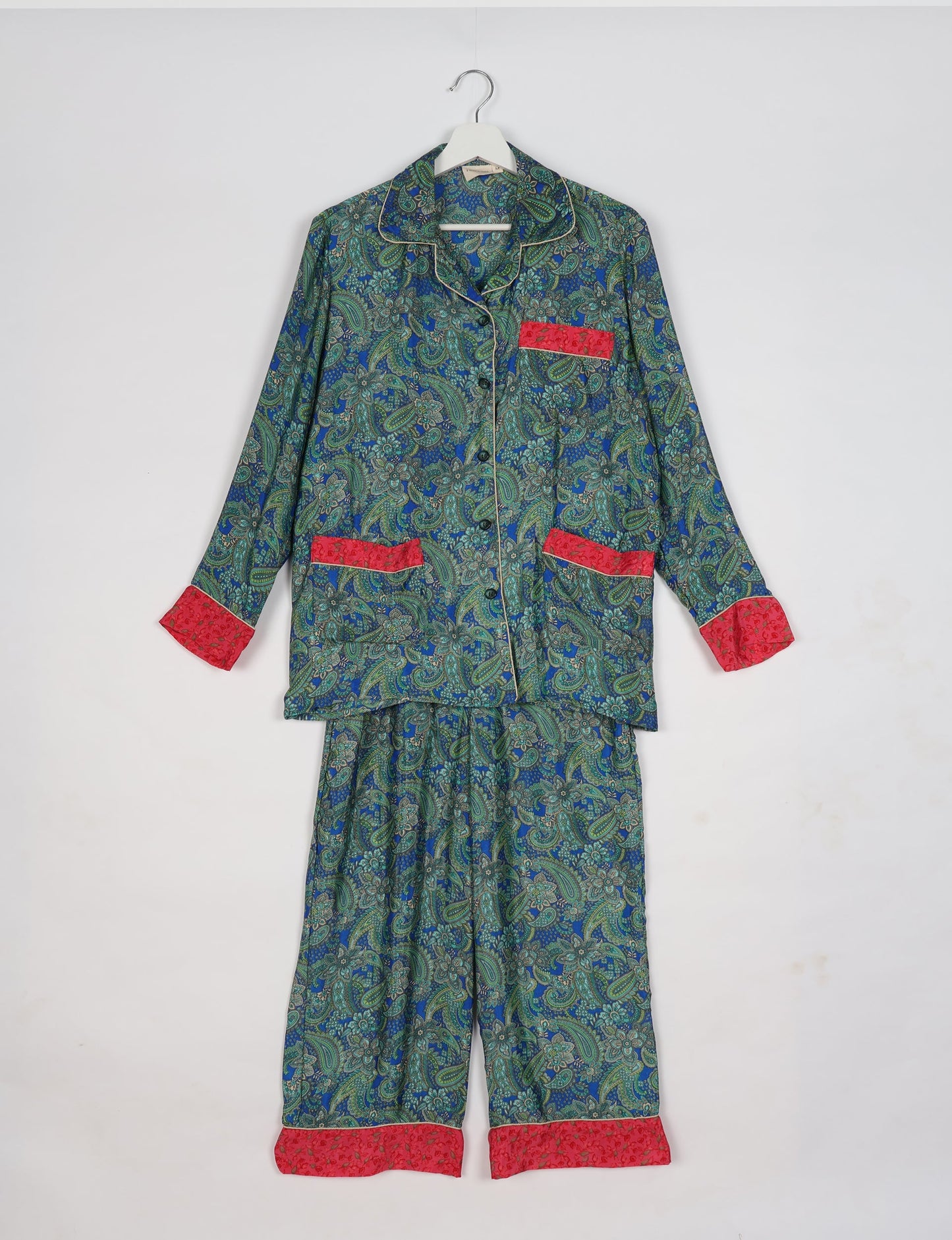Chic long-sleeve pajama set made from recycled materials, representing eco friendly products, repurposed clothing, and zero waste clothing in green fashion.